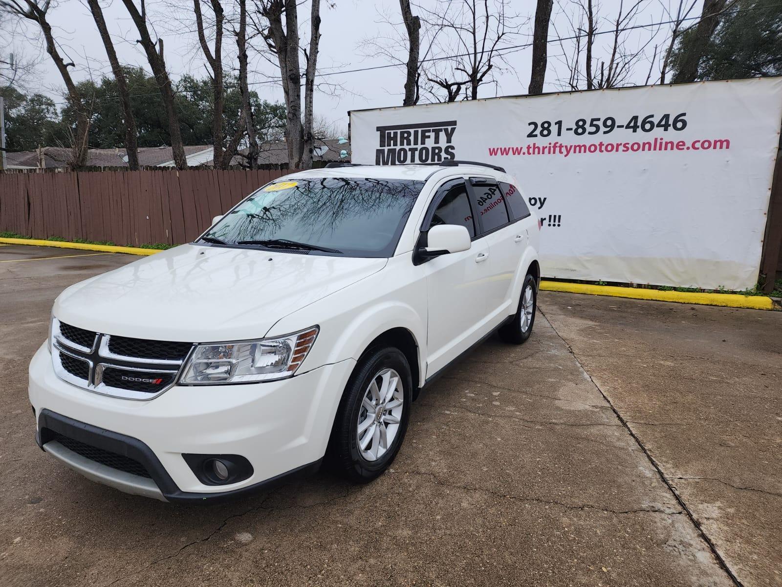 2017 White Dodge Journey SXT (3C4PDCBB5HT) with an 2.4L L6 DOHC 16V engine, 4A transmission, located at 16710 Clay Rd., Houston, TX, 77084, (281) 859-7900, 29.834864, -95.656166 - Low Down. Low Payments. - Photo #3