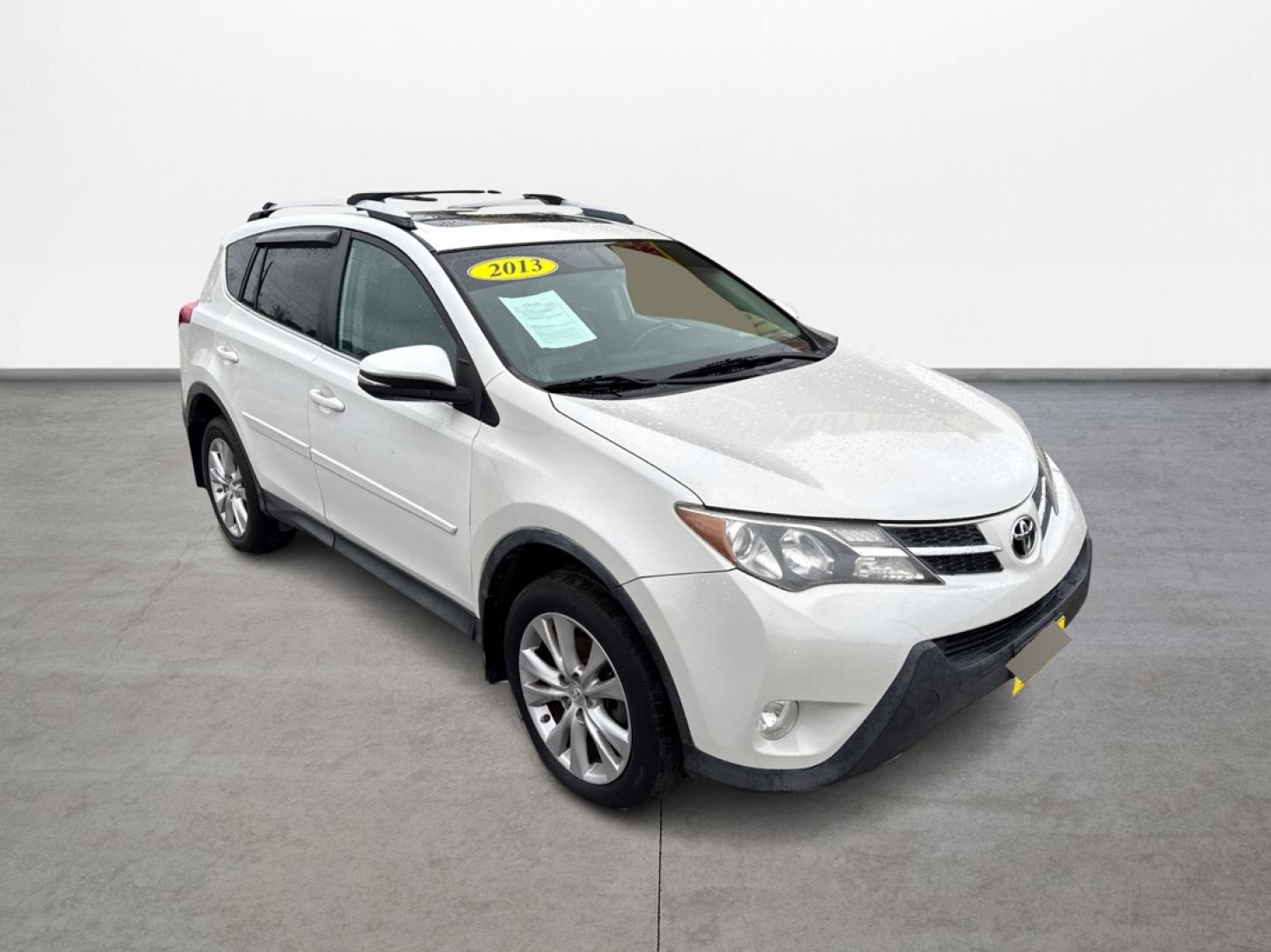 2013 White /Gray Toyota RAV4 Limited AWD (2T3DFREV7DW) with an 2.5L L4 DOHC 16V engine, 6-Speed Automatic transmission, located at 16710 Clay Rd., Houston, TX, 77084, (281) 859-7900, 29.834864, -95.656166 - Low Down. Low Payments. - Photo#2