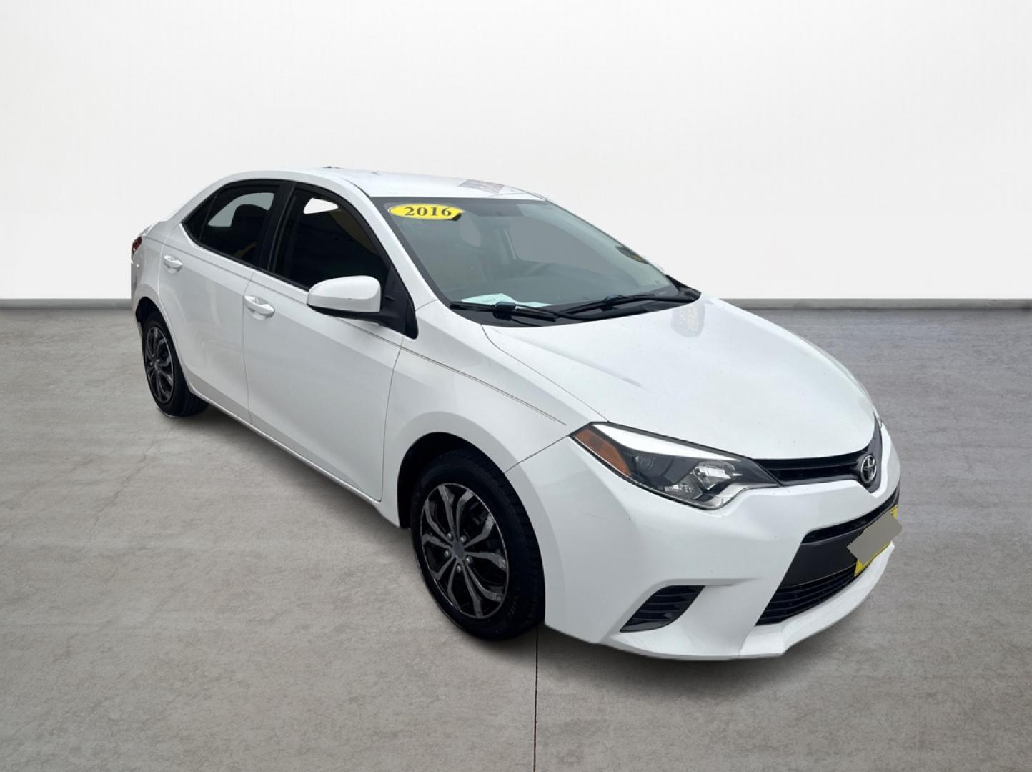 2016 White Toyota Corolla L 4-Speed AT (2T1BURHE7GC) with an 1.8L L4 DOHC 16V engine, 4A transmission, located at 16710 Clay Rd., Houston, TX, 77084, (281) 859-7900, 29.834864, -95.656166 - Low Down. Low Payments. - Photo#2