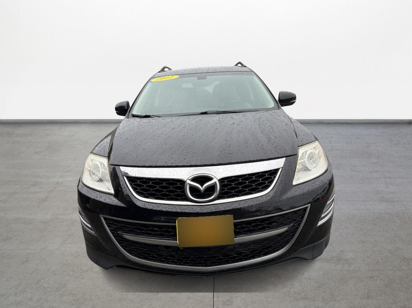 2012 Black /Gray Mazda CX-9 Grand Touring AWD (JM3TB3DV3C0) with an 3.7L V6 DOHC 24V engine, 6-Speed Automatic transmission, located at 16710 Clay Rd., Houston, TX, 77084, (281) 859-7900, 29.834864, -95.656166 - Low Down. Low Payments. - Photo#1
