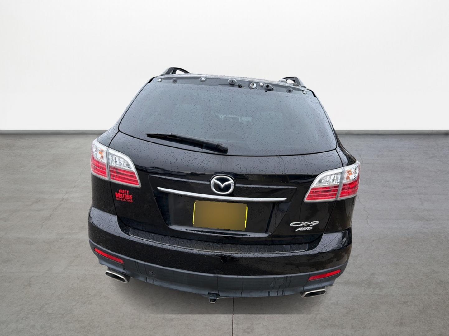 2012 Black /Gray Mazda CX-9 Grand Touring AWD (JM3TB3DV3C0) with an 3.7L V6 DOHC 24V engine, 6-Speed Automatic transmission, located at 16710 Clay Rd., Houston, TX, 77084, (281) 859-7900, 29.834864, -95.656166 - Low Down. Low Payments. - Photo#5