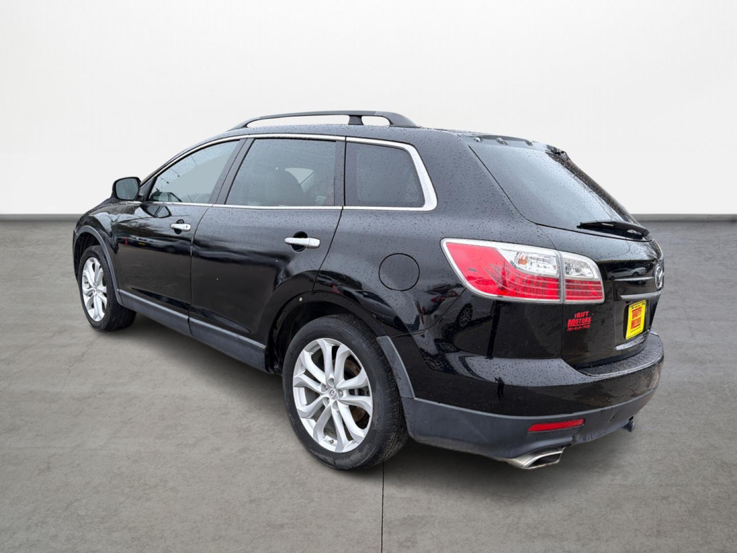 2012 Black /Gray Mazda CX-9 Grand Touring AWD (JM3TB3DV3C0) with an 3.7L V6 DOHC 24V engine, 6-Speed Automatic transmission, located at 16710 Clay Rd., Houston, TX, 77084, (281) 859-7900, 29.834864, -95.656166 - Low Down. Low Payments. - Photo#6