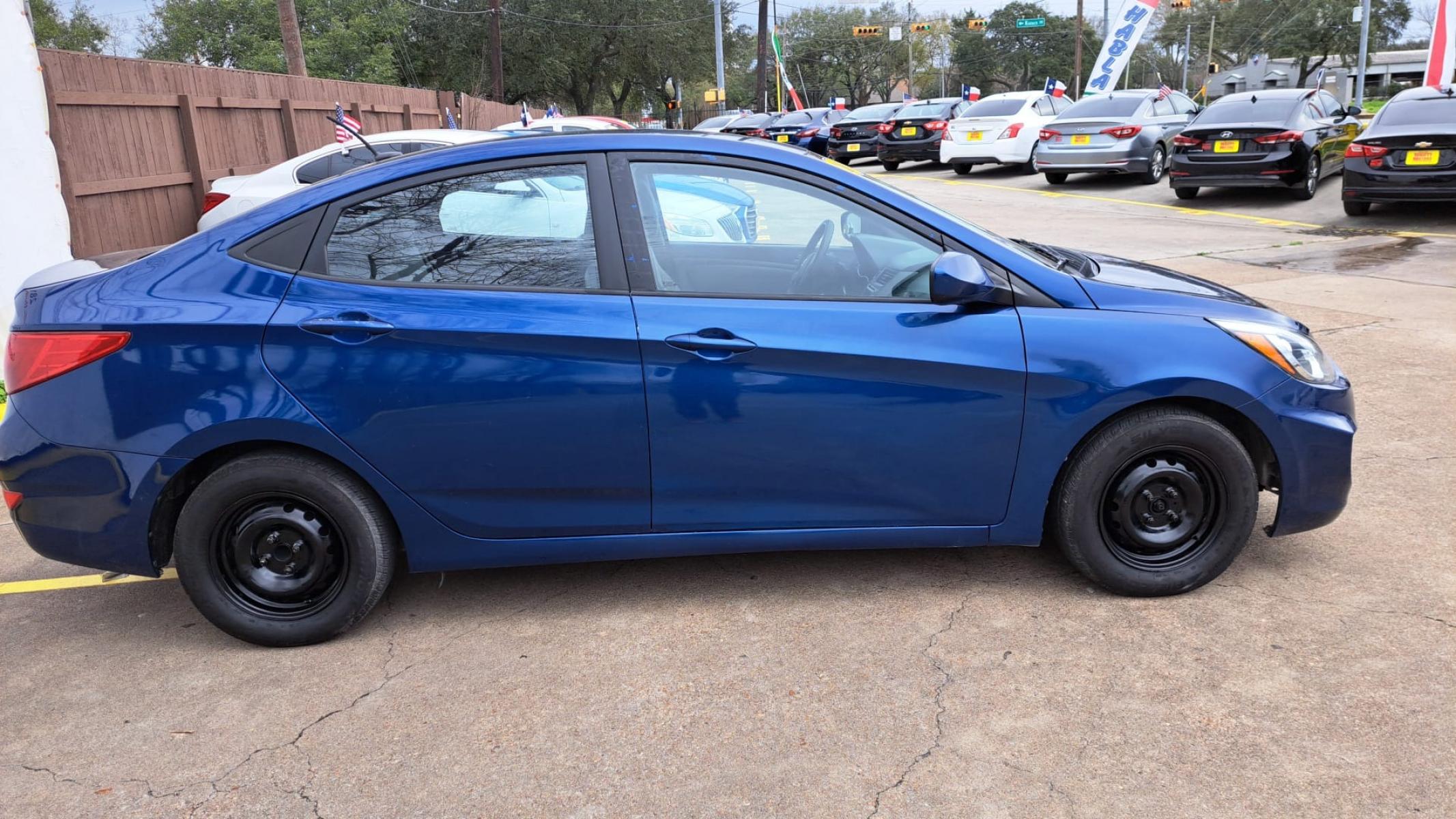 2016 Blue Hyundai Accent SE 4-Door 6A (KMHCT4AE8GU) with an 1.6L L4 DOHC 16V engine, 6A transmission, located at 16710 Clay Rd., Houston, TX, 77084, (281) 859-7900, 29.834864, -95.656166 - Low Down. Low Payments. - Photo #4