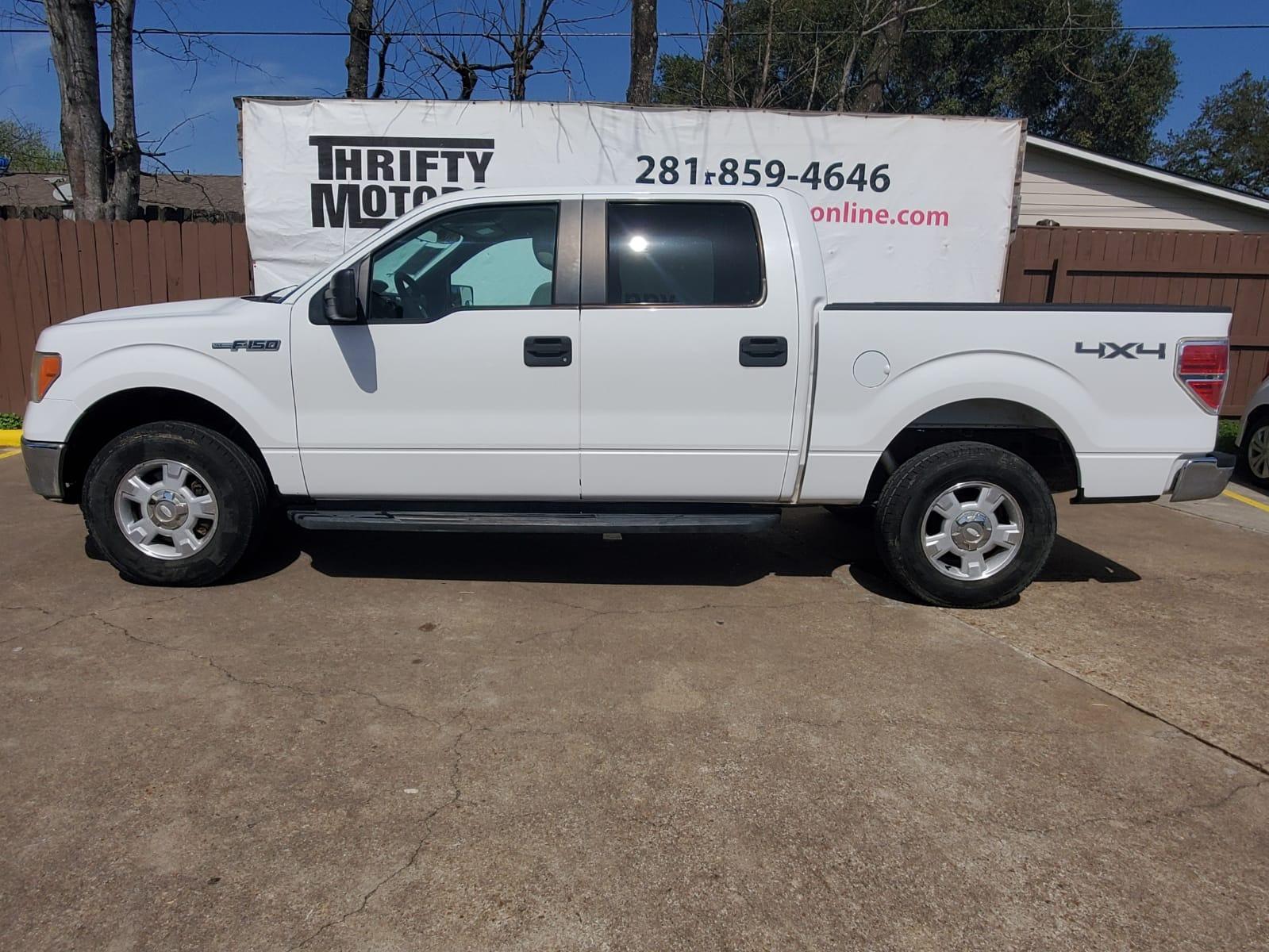 2010 White Ford F-150 Lariat SuperCrew 5.5-ft. Bed 4WD (1FTEW1E85AF) with an 4.6L V8 SOHC 24V engine, 4-Speed Automatic transmission, located at 16710 Clay Rd., Houston, TX, 77084, (281) 859-7900, 29.834864, -95.656166 - Low Down. Low Payments. - Photo #0