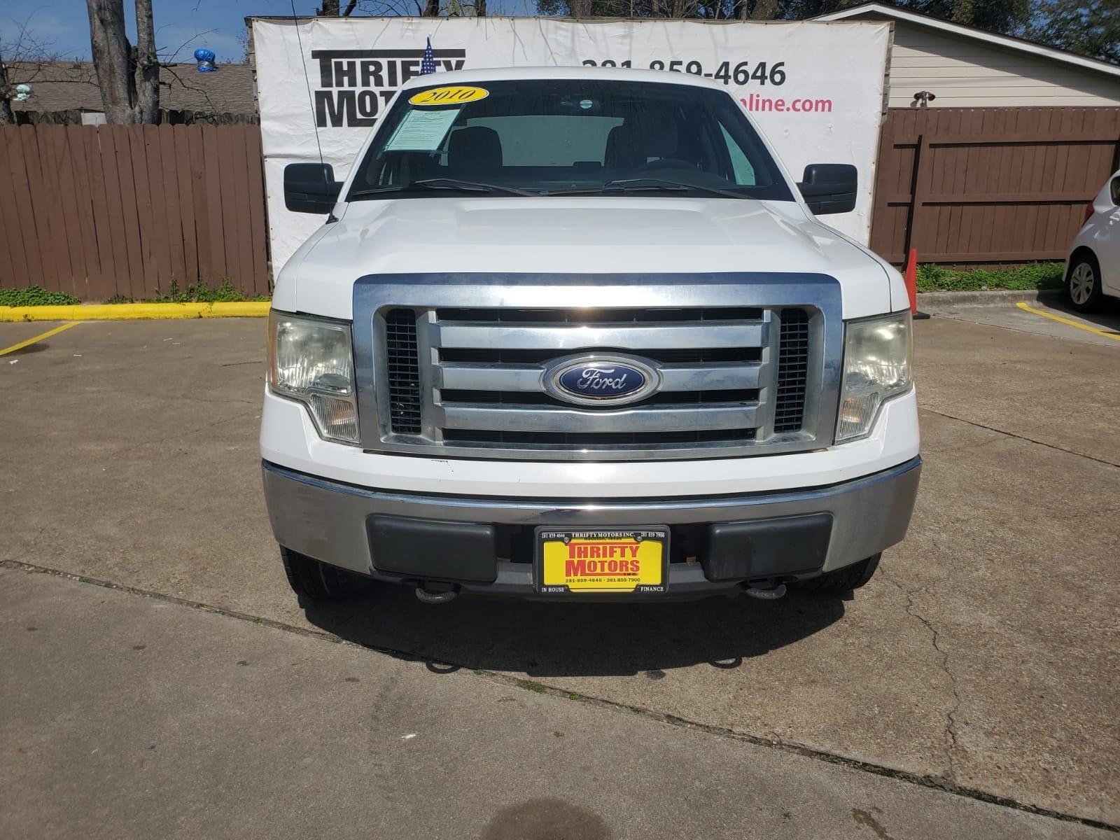 2010 White Ford F-150 Lariat SuperCrew 5.5-ft. Bed 4WD (1FTEW1E85AF) with an 4.6L V8 SOHC 24V engine, 4-Speed Automatic transmission, located at 16710 Clay Rd., Houston, TX, 77084, (281) 859-7900, 29.834864, -95.656166 - Low Down. Low Payments. - Photo #1