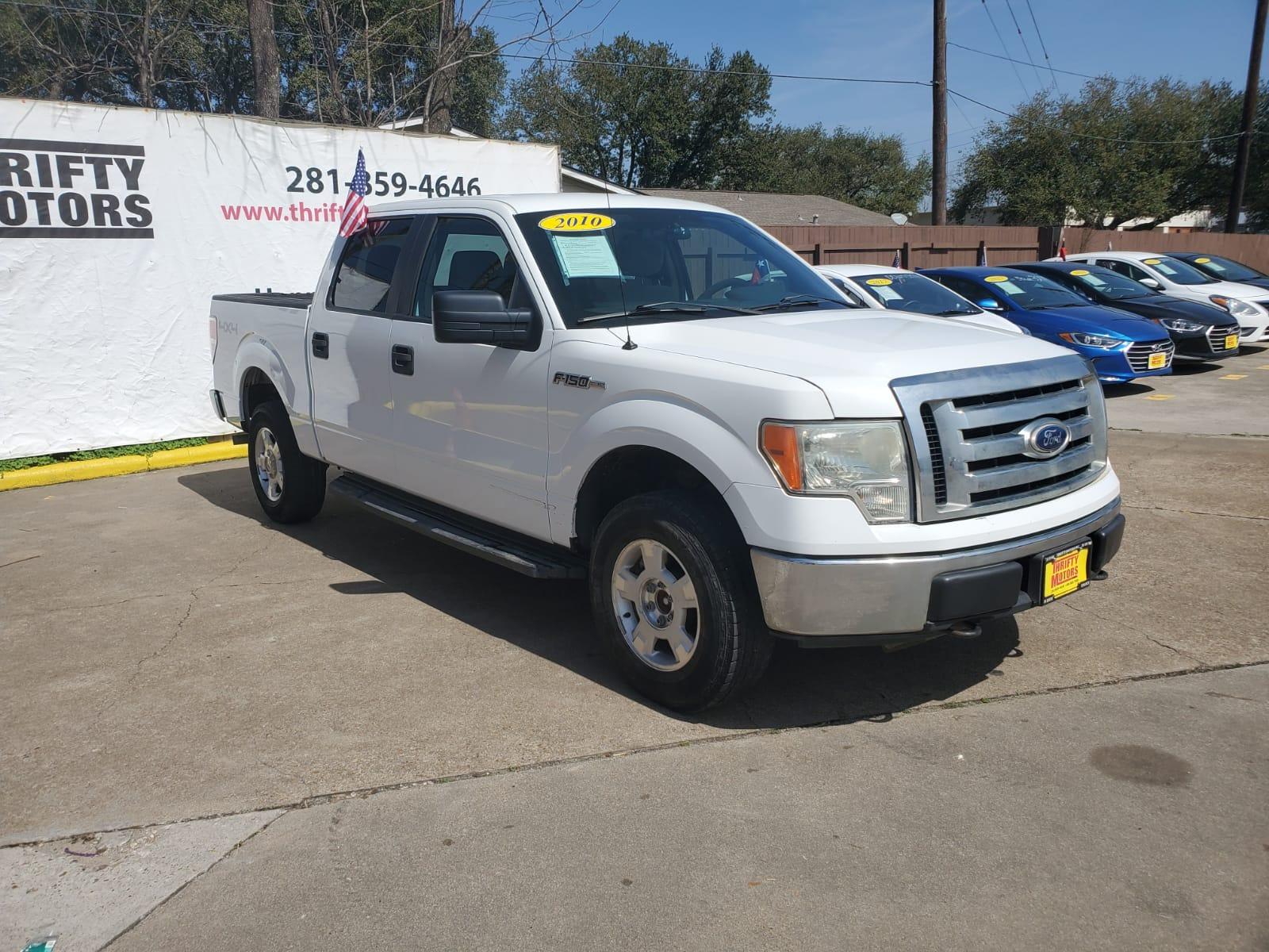2010 White Ford F-150 Lariat SuperCrew 5.5-ft. Bed 4WD (1FTEW1E85AF) with an 4.6L V8 SOHC 24V engine, 4-Speed Automatic transmission, located at 16710 Clay Rd., Houston, TX, 77084, (281) 859-7900, 29.834864, -95.656166 - Low Down. Low Payments. - Photo #3