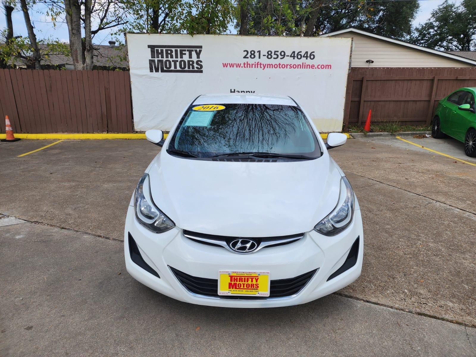 2016 White Hyundai Elantra (5NPDH4AE1GH) with an 1.8L I4 1.8L I4 engine, Automatic 6-Speed transmission, located at 16710 Clay Rd., Houston, TX, 77084, (281) 859-7900, 29.834864, -95.656166 - Low Down. Low payments - Photo #1