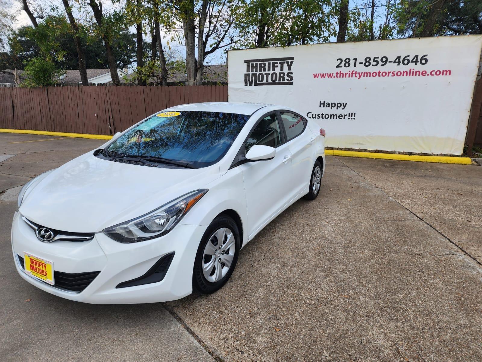 2016 White Hyundai Elantra (5NPDH4AE1GH) with an 1.8L I4 1.8L I4 engine, Automatic 6-Speed transmission, located at 16710 Clay Rd., Houston, TX, 77084, (281) 859-7900, 29.834864, -95.656166 - Low Down. Low payments - Photo #2