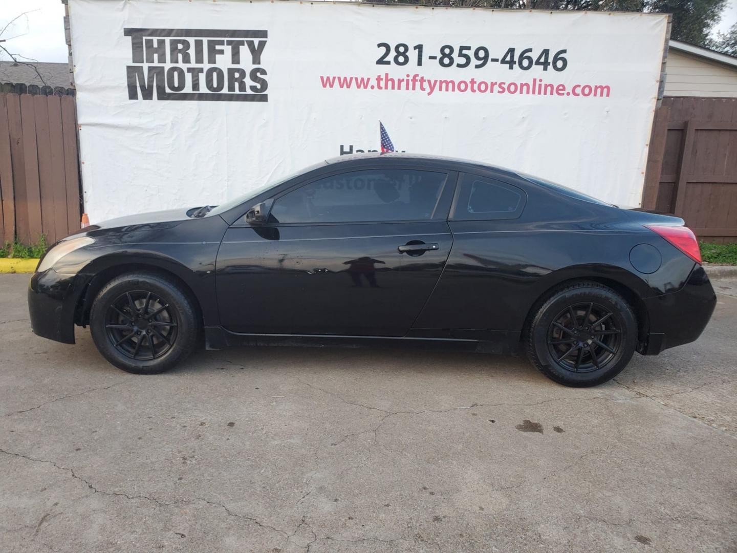 2008 Black Nissan Altima 2.5 S Coupe (1N4AL24E28C) with an 2.5L L4 DOHC 16V engine, located at 16710 Clay Rd., Houston, TX, 77084, (281) 859-7900, 29.834864, -95.656166 - Photo#0