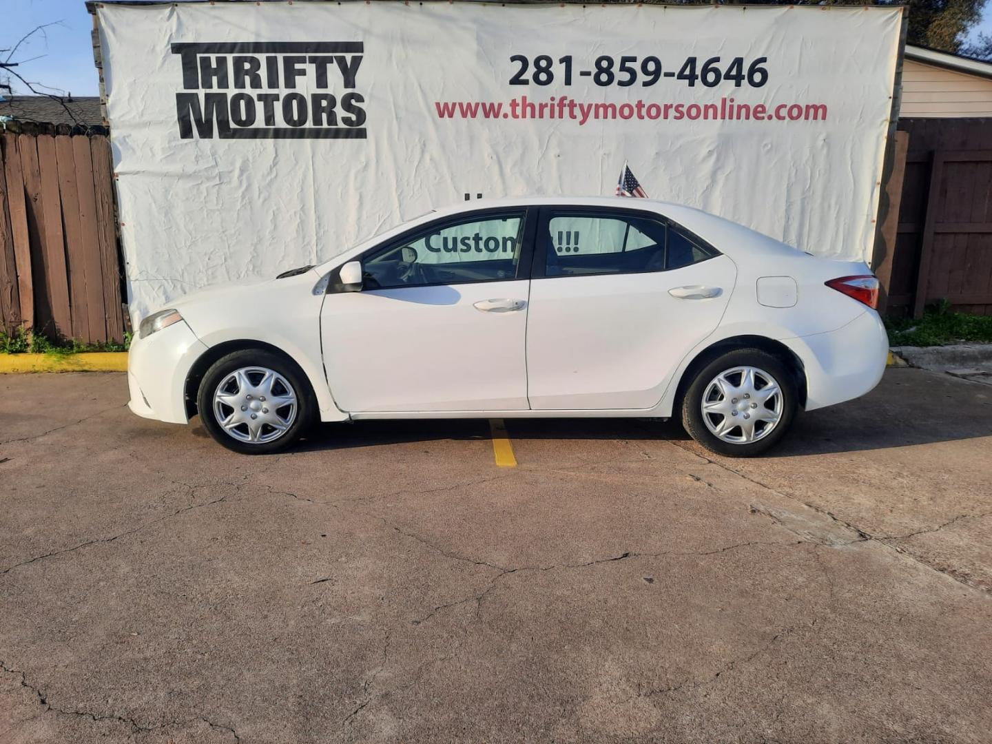 2015 White /Gray Toyota Corolla L 4-Speed AT (2T1BURHE2FC) with an 1.8L L4 DOHC 16V engine, Automatic 4-Speed transmission, located at 16710 Clay Rd., Houston, TX, 77084, (281) 859-7900, 29.834864, -95.656166 - Low Down. Low Payments. - Photo#0