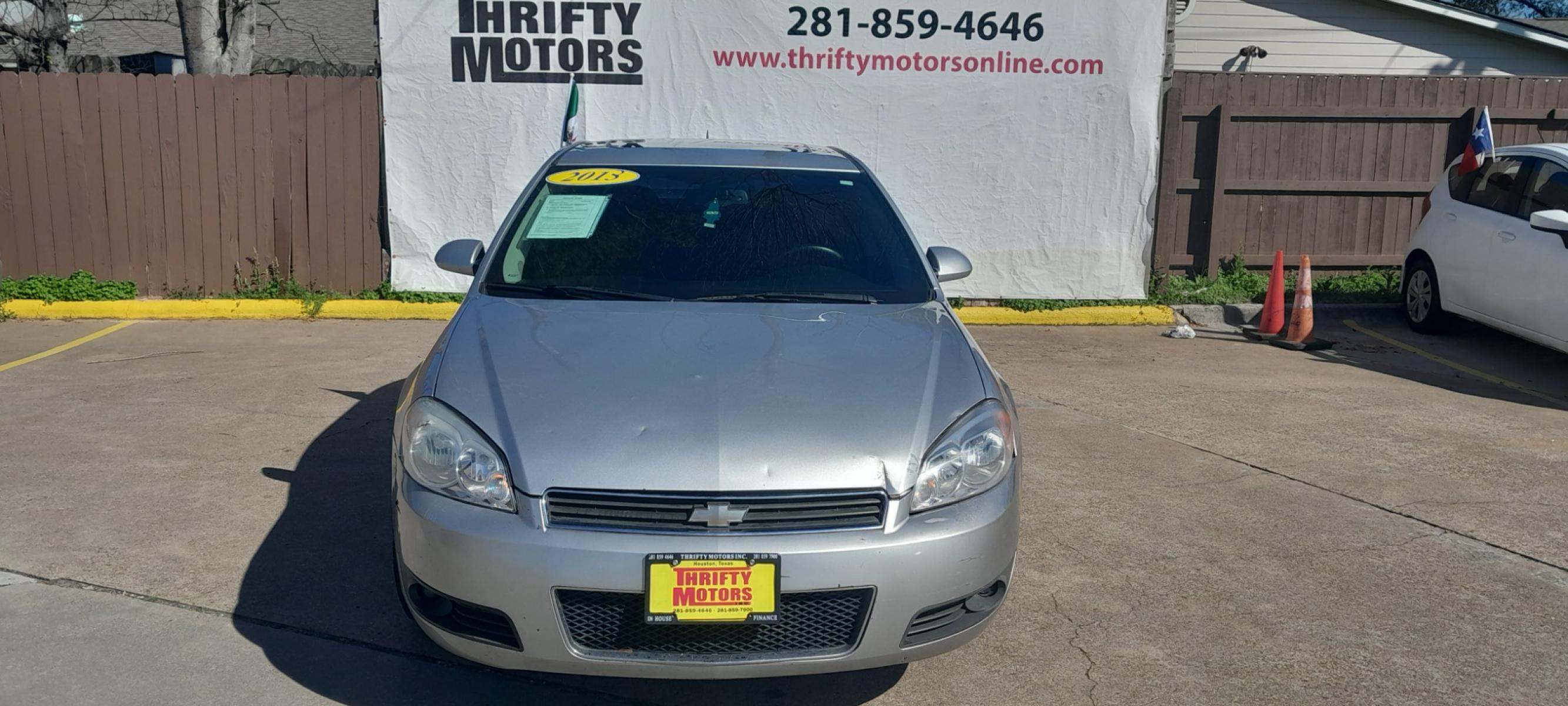 2013 Silver Chevrolet Impala LT (Fleet) (2G1WG5E33D1) with an 3.6L V6 DOHC 16V FFV engine, 6-Speed Automatic transmission, located at 16710 Clay Rd., Houston, TX, 77084, (281) 859-7900, 29.834864, -95.656166 - Carro de Cash. - Photo #1