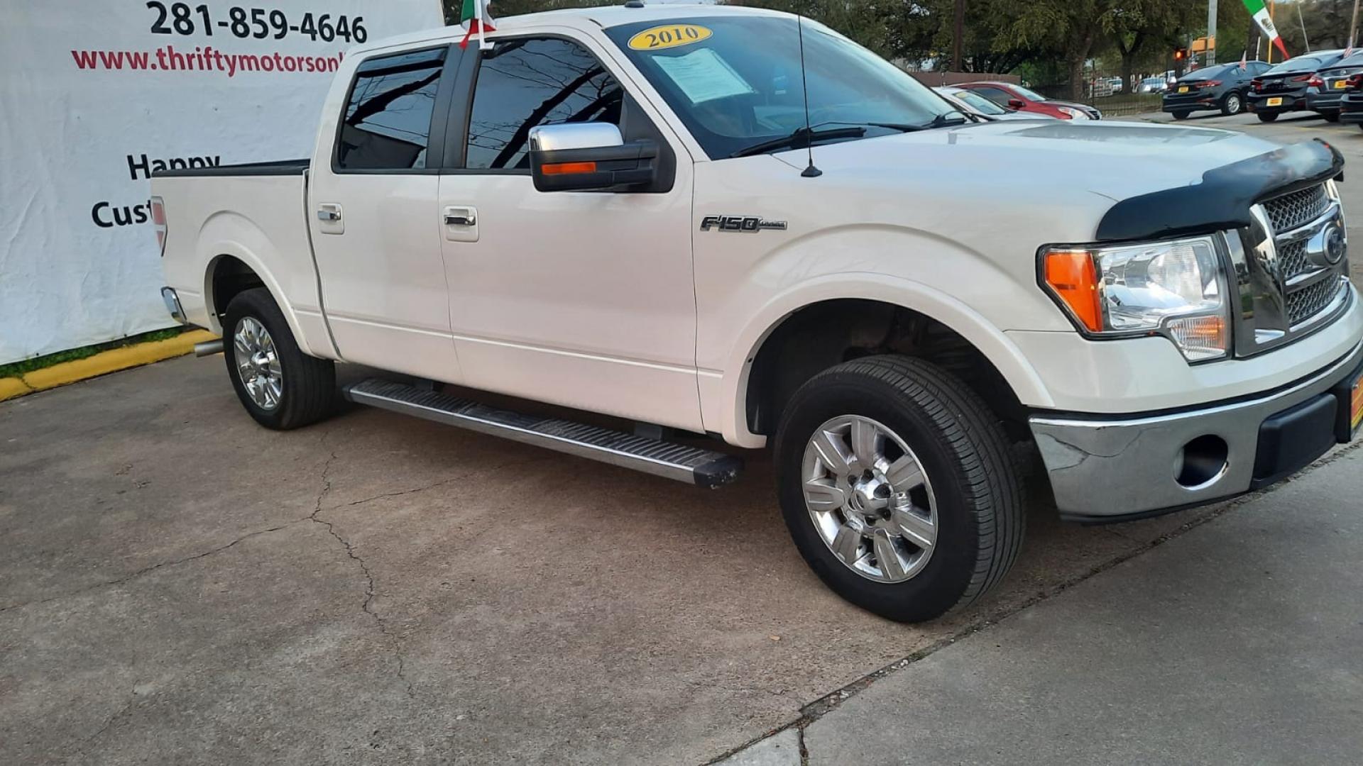 2010 White Ford F-150 Lariat SuperCrew 5.5-ft. Bed 2WD (1FTFW1CV0AK) with an 5.4L V8 SOHC 24V FFV engine, 4-Speed Automatic transmission, located at 16710 Clay Rd., Houston, TX, 77084, (281) 859-7900, 29.834864, -95.656166 - Low Down. Low Payments. - Photo#2
