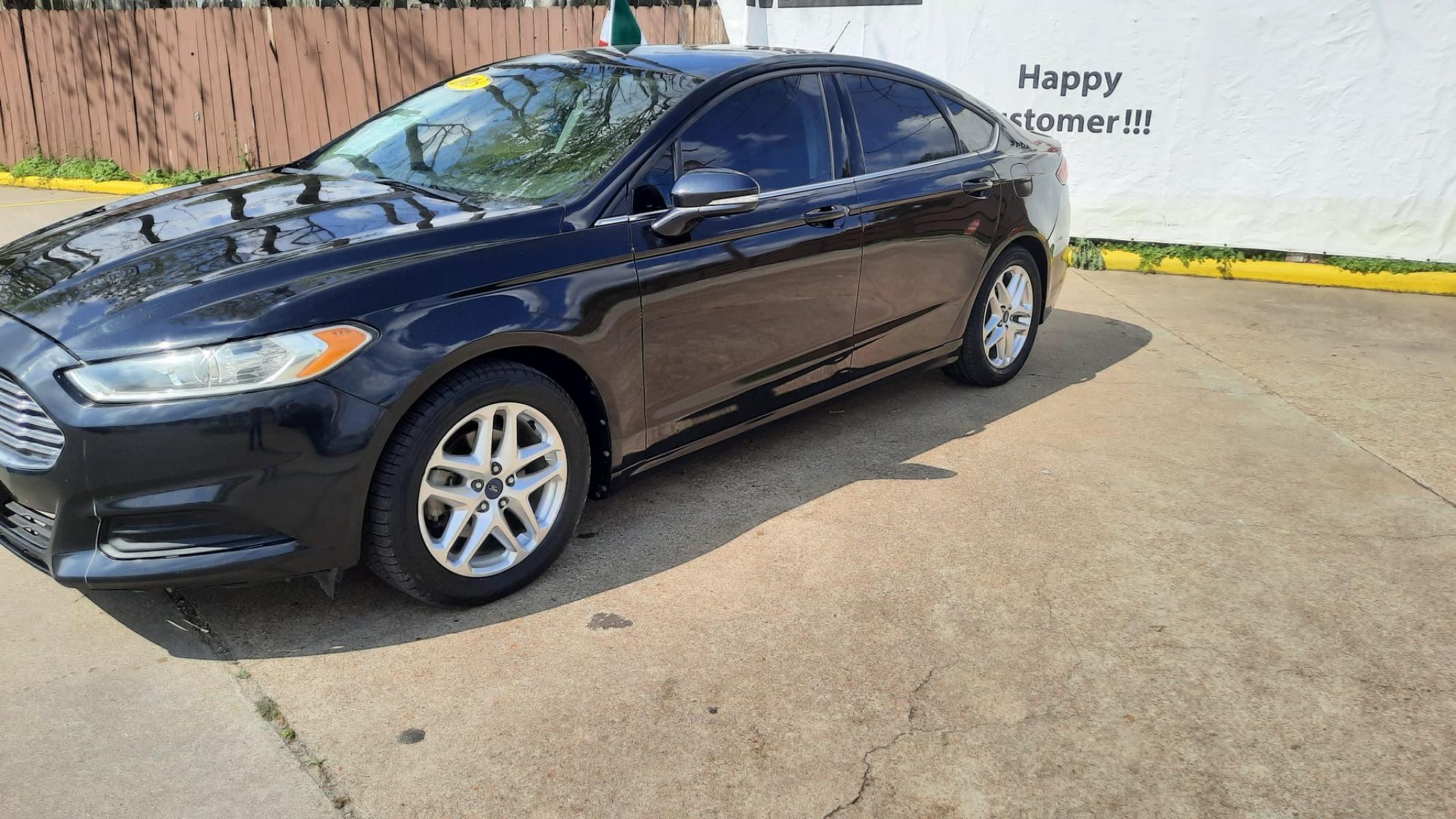 2013 Black Ford Fusion SE (3FA6P0HR7DR) with an 1.6L L4 DOHC 16V engine, located at 16710 Clay Rd., Houston, TX, 77084, (281) 859-7900, 29.834864, -95.656166 - LOW DOWN. LOW PAYMENTS. - Photo #2