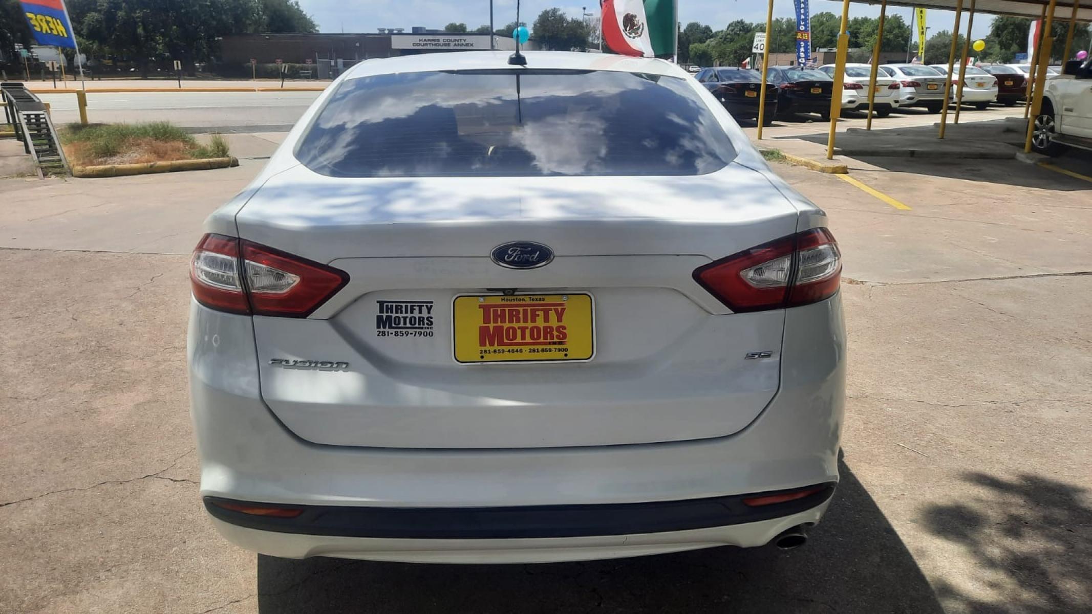 2015 Ford Fusion SE (3FA6P0H73FR) with an 2.5L L4 DOHC 16V engine, located at 16710 Clay Rd., Houston, TX, 77084, (281) 859-7900, 29.834864, -95.656166 - Photo #4