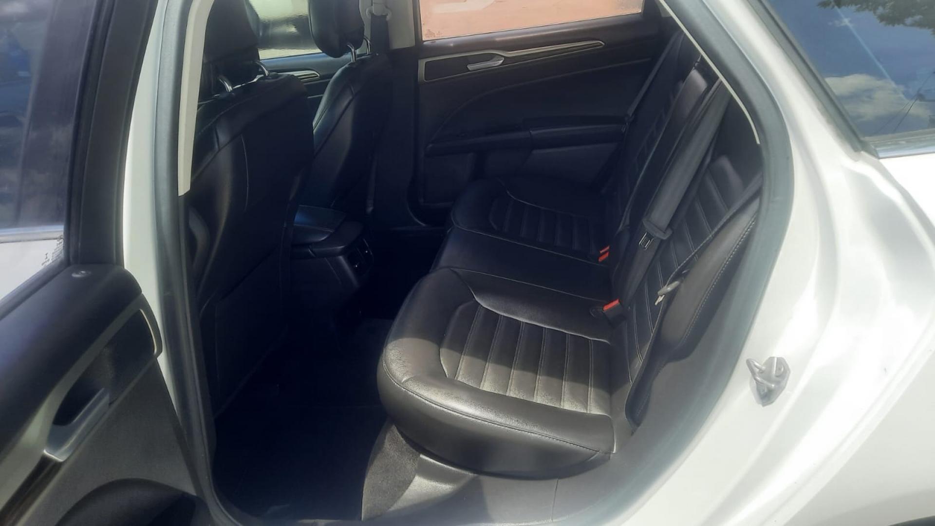 2014 Ford Fusion SE (3FA6P0H90ER) with an 2.0L L4 DOHC 16V engine, located at 16710 Clay Rd., Houston, TX, 77084, (281) 859-7900, 29.834864, -95.656166 - Photo#2