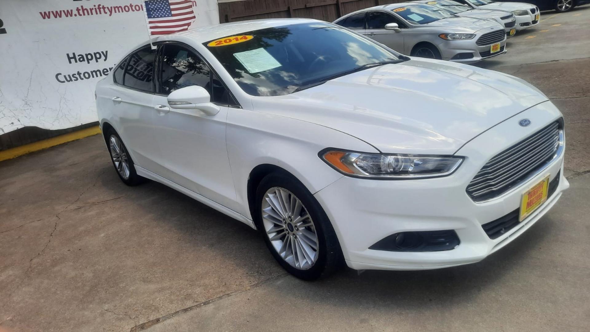 2014 Ford Fusion SE (3FA6P0H90ER) with an 2.0L L4 DOHC 16V engine, located at 16710 Clay Rd., Houston, TX, 77084, (281) 859-7900, 29.834864, -95.656166 - Photo#5
