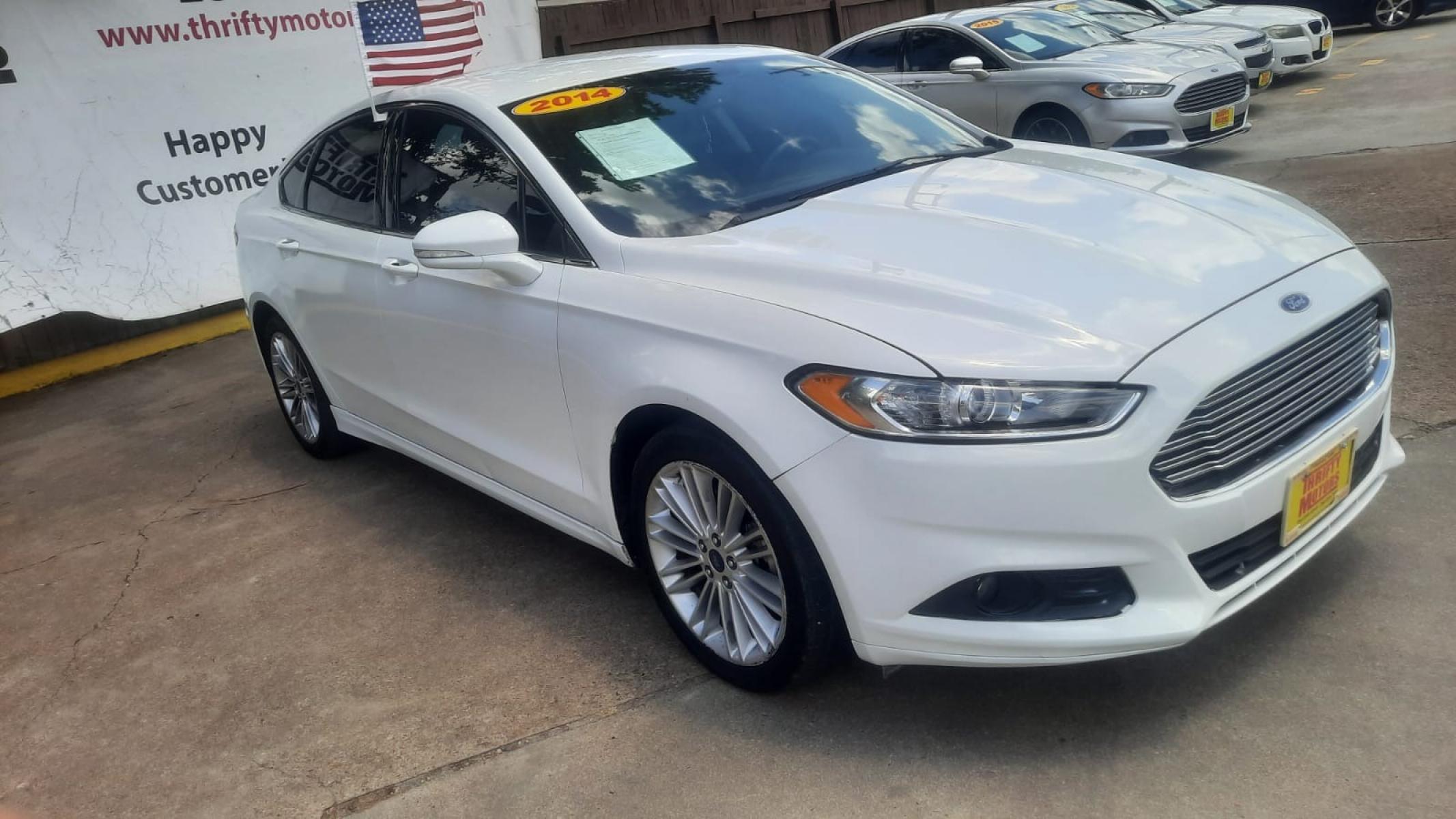 2014 Ford Fusion SE (3FA6P0H90ER) with an 2.0L L4 DOHC 16V engine, located at 16710 Clay Rd., Houston, TX, 77084, (281) 859-7900, 29.834864, -95.656166 - Photo #5