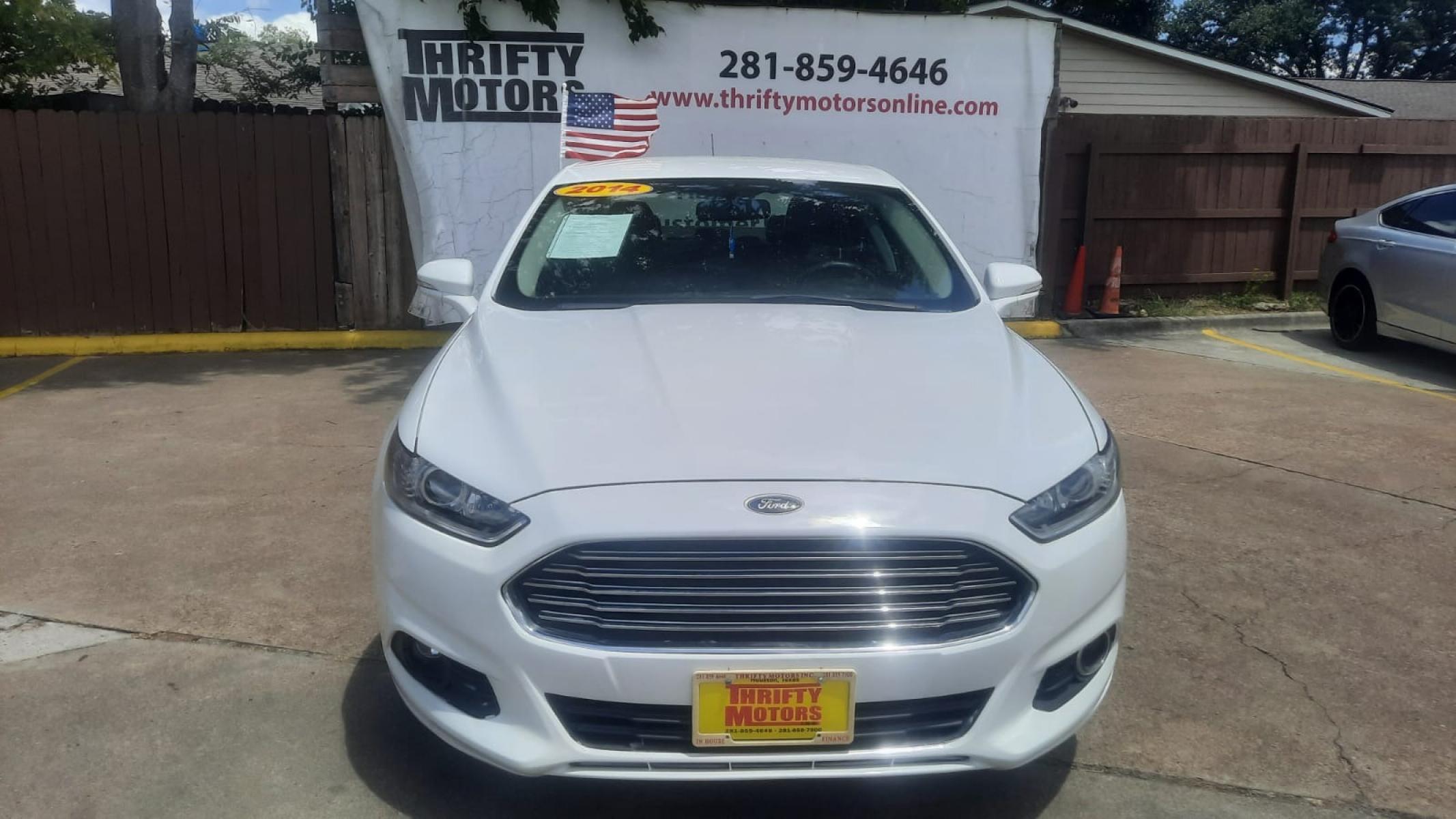 2014 Ford Fusion SE (3FA6P0H90ER) with an 2.0L L4 DOHC 16V engine, located at 16710 Clay Rd., Houston, TX, 77084, (281) 859-7900, 29.834864, -95.656166 - Photo #7
