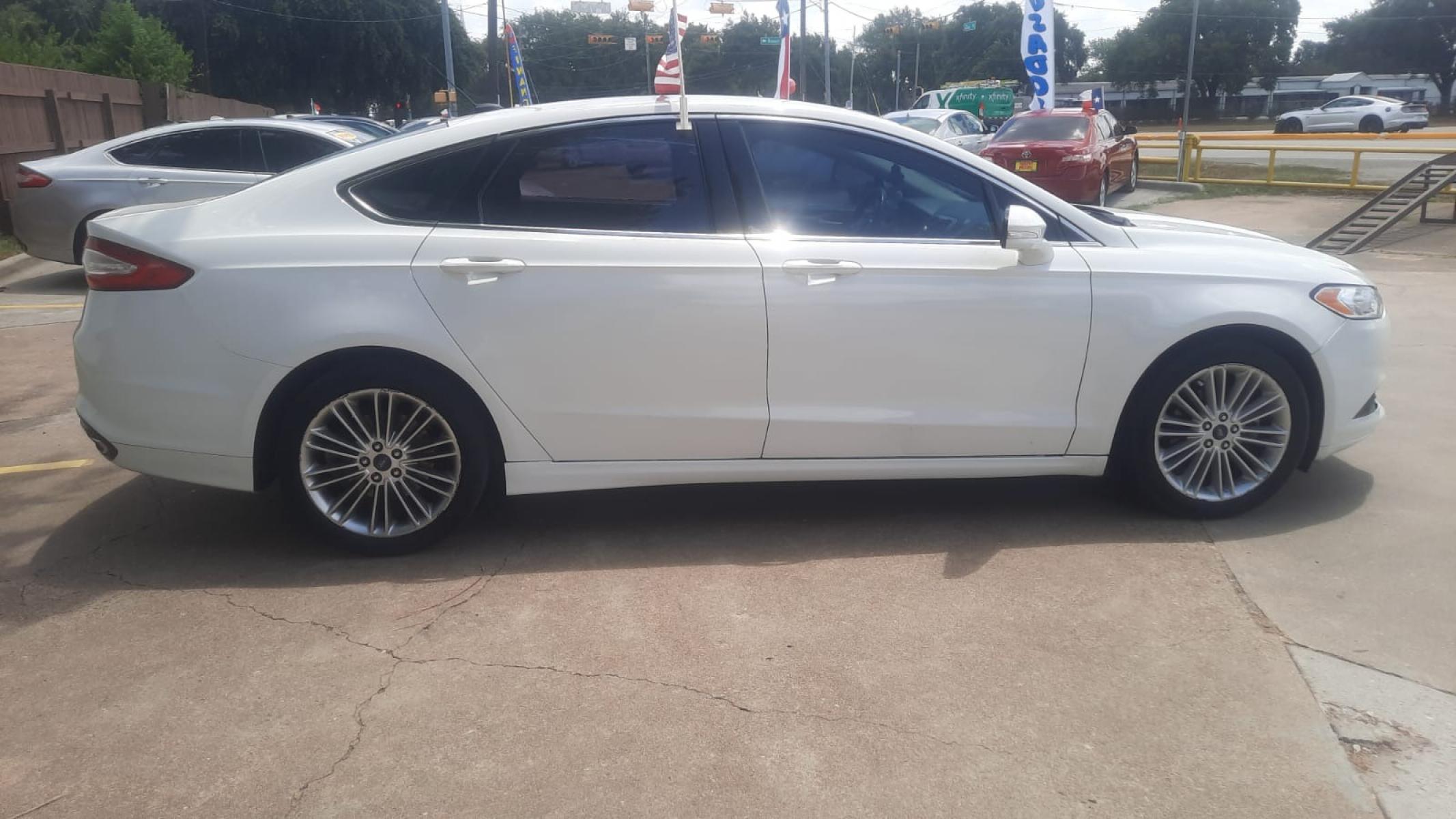 2014 Ford Fusion SE (3FA6P0H90ER) with an 2.0L L4 DOHC 16V engine, located at 16710 Clay Rd., Houston, TX, 77084, (281) 859-7900, 29.834864, -95.656166 - Photo #8