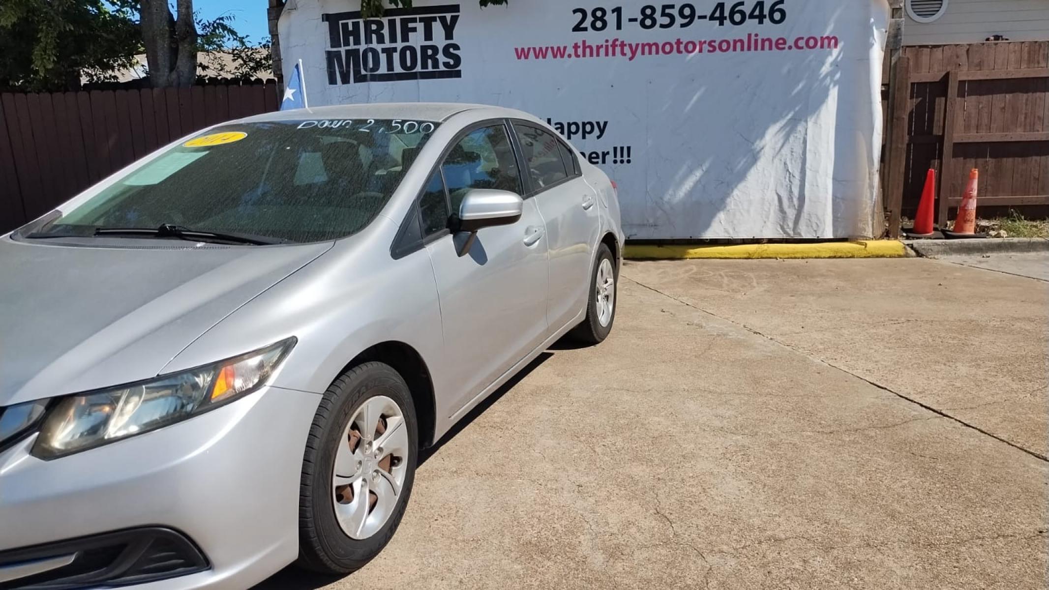 2014 Honda Civic LX Sedan CVT (19XFB2F52EE) with an 1.8L L4 SOHC 16V engine, Continuously Variable Transmission transmission, located at 16710 Clay Rd., Houston, TX, 77084, (281) 859-7900, 29.834864, -95.656166 - Photo #4
