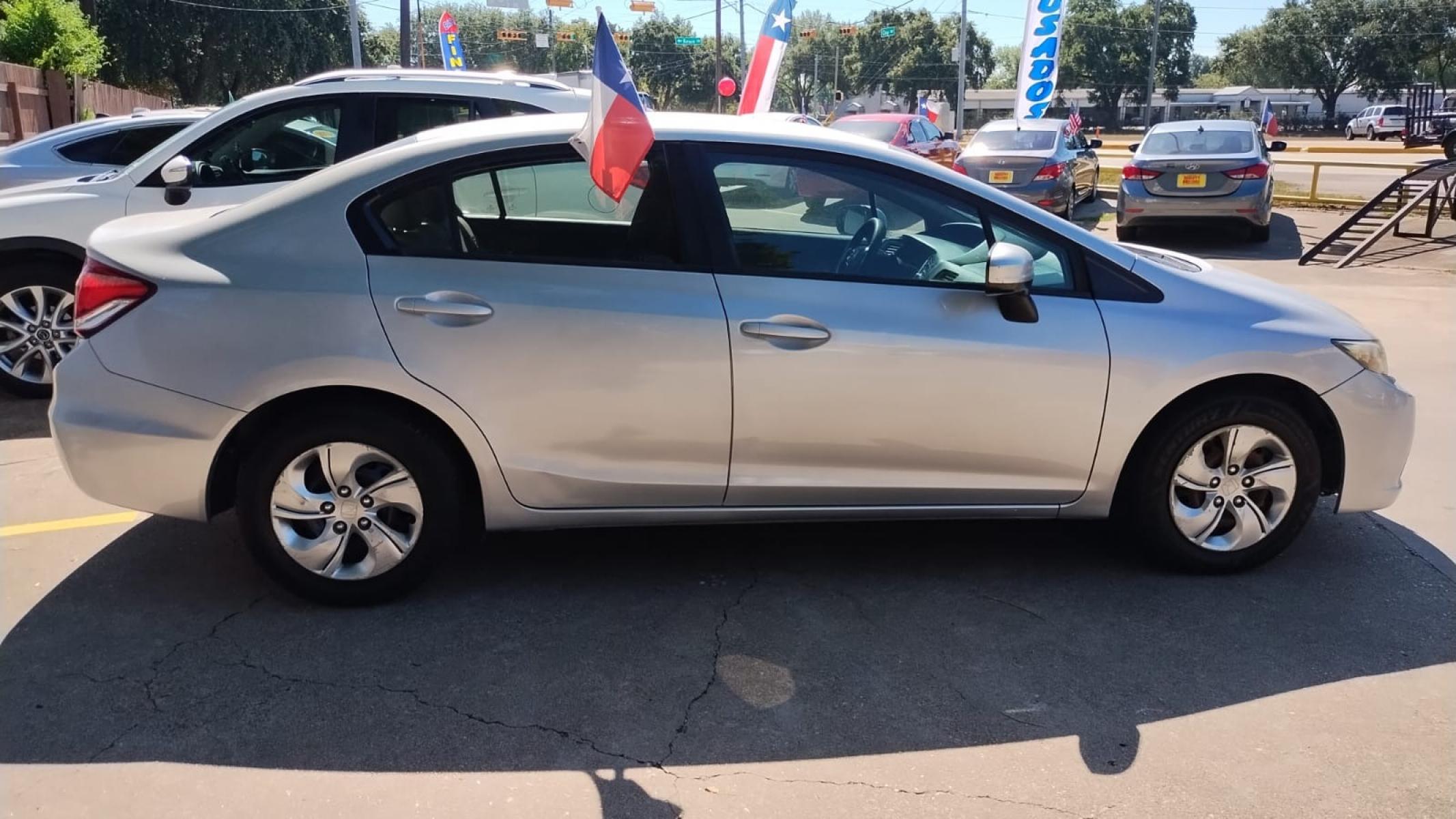 2014 Honda Civic LX Sedan CVT (19XFB2F52EE) with an 1.8L L4 SOHC 16V engine, Continuously Variable Transmission transmission, located at 16710 Clay Rd., Houston, TX, 77084, (281) 859-7900, 29.834864, -95.656166 - Photo #7