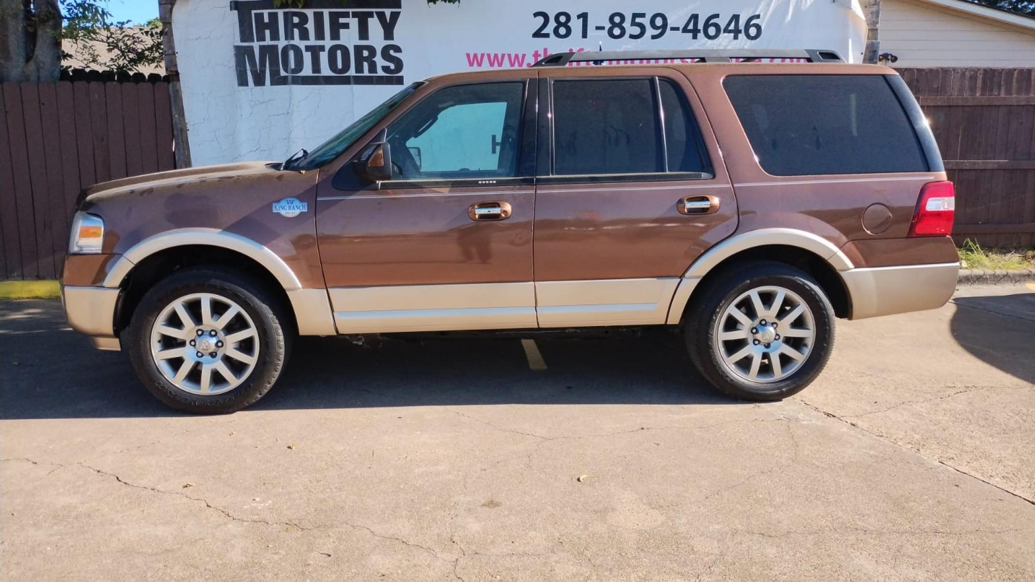 2012 Ford Expedition King Ranch 2WD (1FMJU1H57CE) with an 5.4L V8 SOHC 16V FFV engine, 6-Speed Automatic transmission, located at 16710 Clay Rd., Houston, TX, 77084, (281) 859-7900, 29.834864, -95.656166 - Photo #9