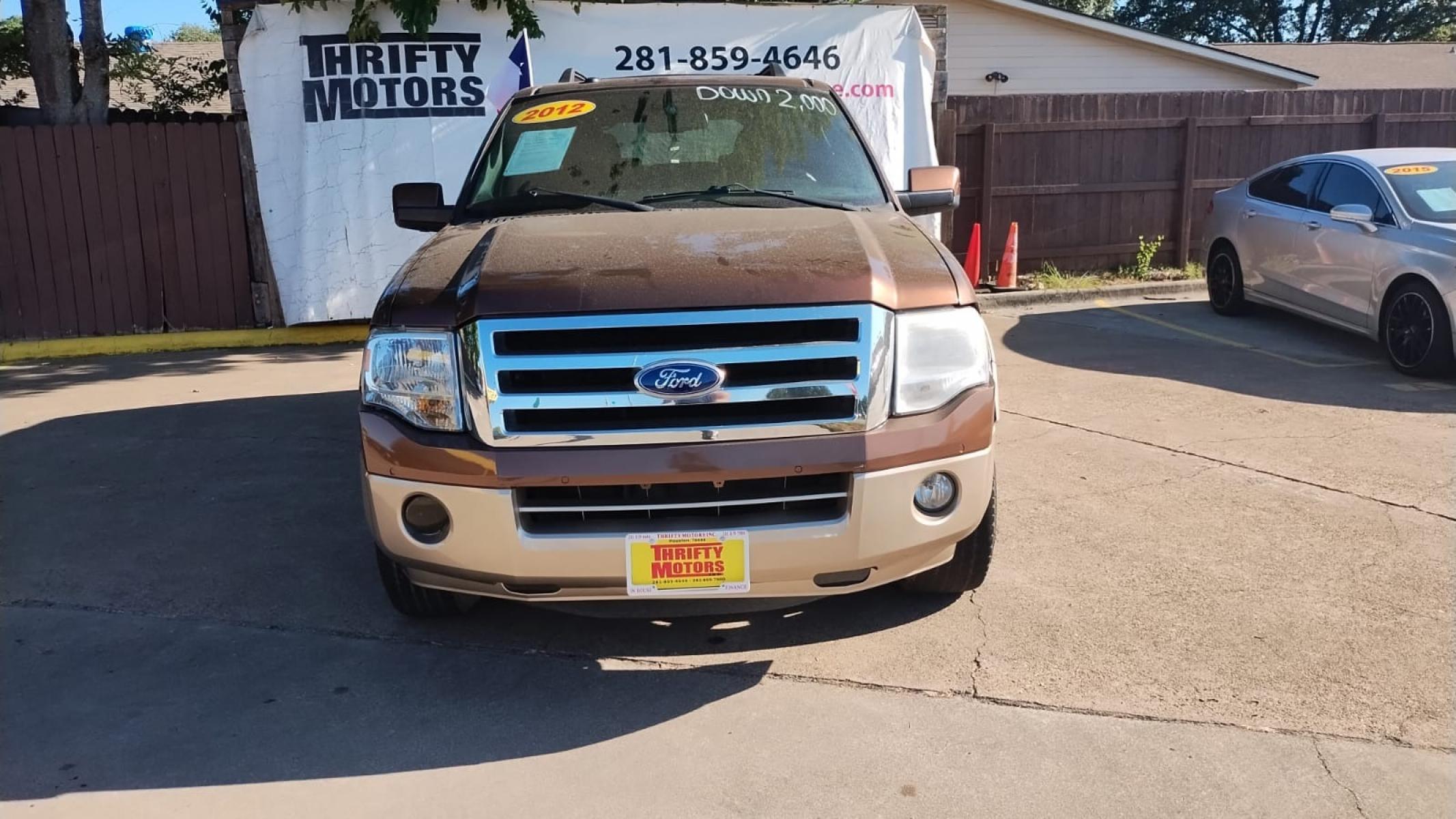 2012 Ford Expedition King Ranch 2WD (1FMJU1H57CE) with an 5.4L V8 SOHC 16V FFV engine, 6-Speed Automatic transmission, located at 16710 Clay Rd., Houston, TX, 77084, (281) 859-7900, 29.834864, -95.656166 - Photo #7