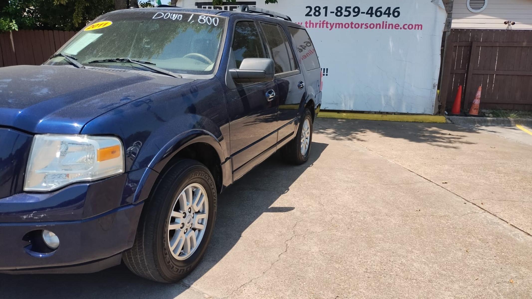2011 Ford Expedition King Ranch 2WD (1FMJU1H51BE) with an 5.4L V8 SOHC 16V FFV engine, 6-Speed Automatic transmission, located at 16710 Clay Rd., Houston, TX, 77084, (281) 859-7900, 29.834864, -95.656166 - Photo #5