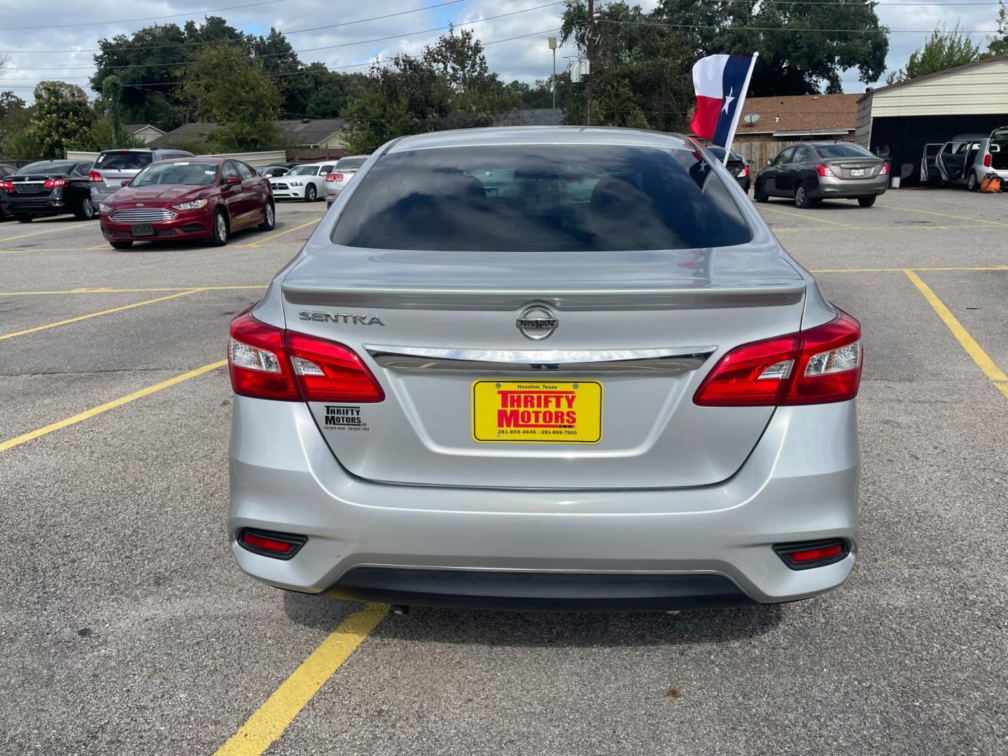 2017 Nissan Sentra S 6MT (3N1AB7AP9HY) with an 1.8L L4 SFI DOHC 16V engine, 6M transmission, located at 16710 Clay Rd., Houston, TX, 77084, (281) 859-7900, 29.834864, -95.656166 - Low Down...Low Monthly Payments - Photo#3
