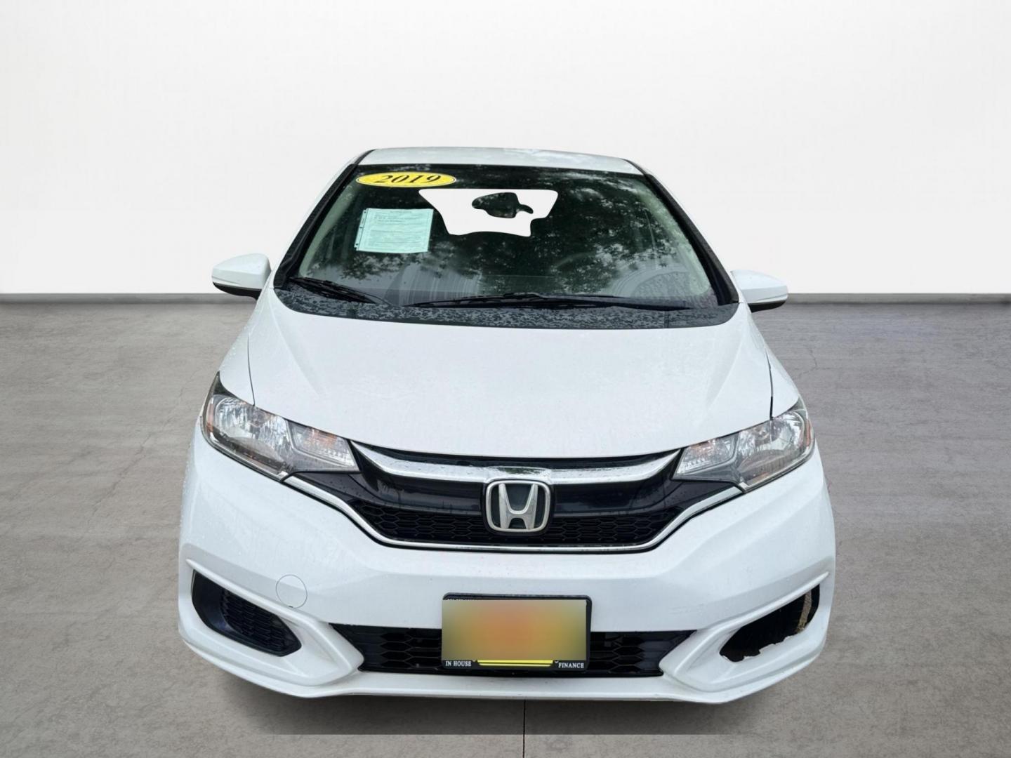 2019 White /Gray Honda Fit LX CVT (3HGGK5H47KM) with an 1.5L L4 SOHC 16V engine, Automatic transmission, located at 16710 Clay Rd., Houston, TX, 77084, (281) 859-7900, 29.834864, -95.656166 - Photo#1