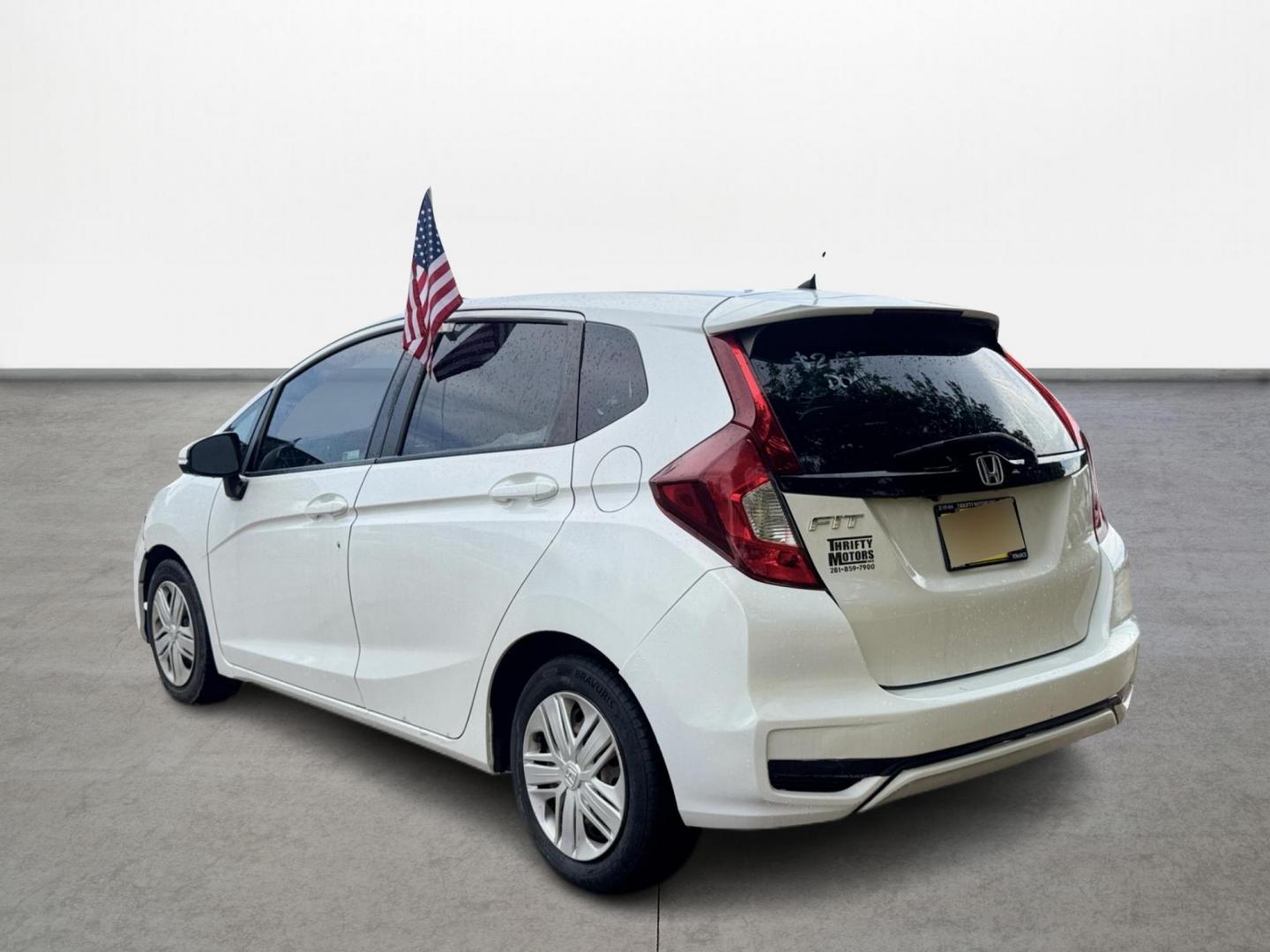 2019 White /Gray Honda Fit LX CVT (3HGGK5H47KM) with an 1.5L L4 SOHC 16V engine, Automatic transmission, located at 16710 Clay Rd., Houston, TX, 77084, (281) 859-7900, 29.834864, -95.656166 - Photo#6