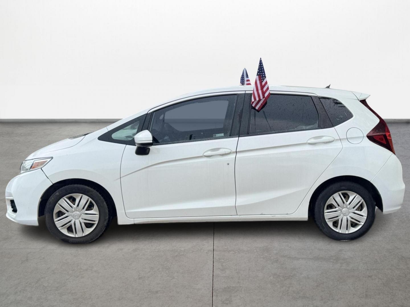 2019 White /Gray Honda Fit LX CVT (3HGGK5H47KM) with an 1.5L L4 SOHC 16V engine, Automatic transmission, located at 16710 Clay Rd., Houston, TX, 77084, (281) 859-7900, 29.834864, -95.656166 - Photo#7