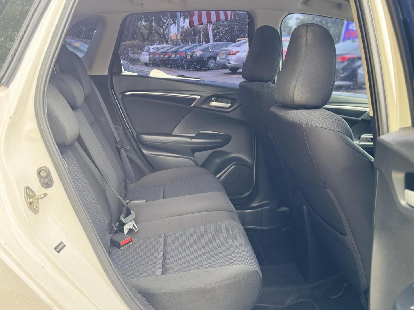 2019 White /Gray Honda Fit LX CVT (3HGGK5H47KM) with an 1.5L L4 SOHC 16V engine, Automatic transmission, located at 16710 Clay Rd., Houston, TX, 77084, (281) 859-7900, 29.834864, -95.656166 - Photo#11