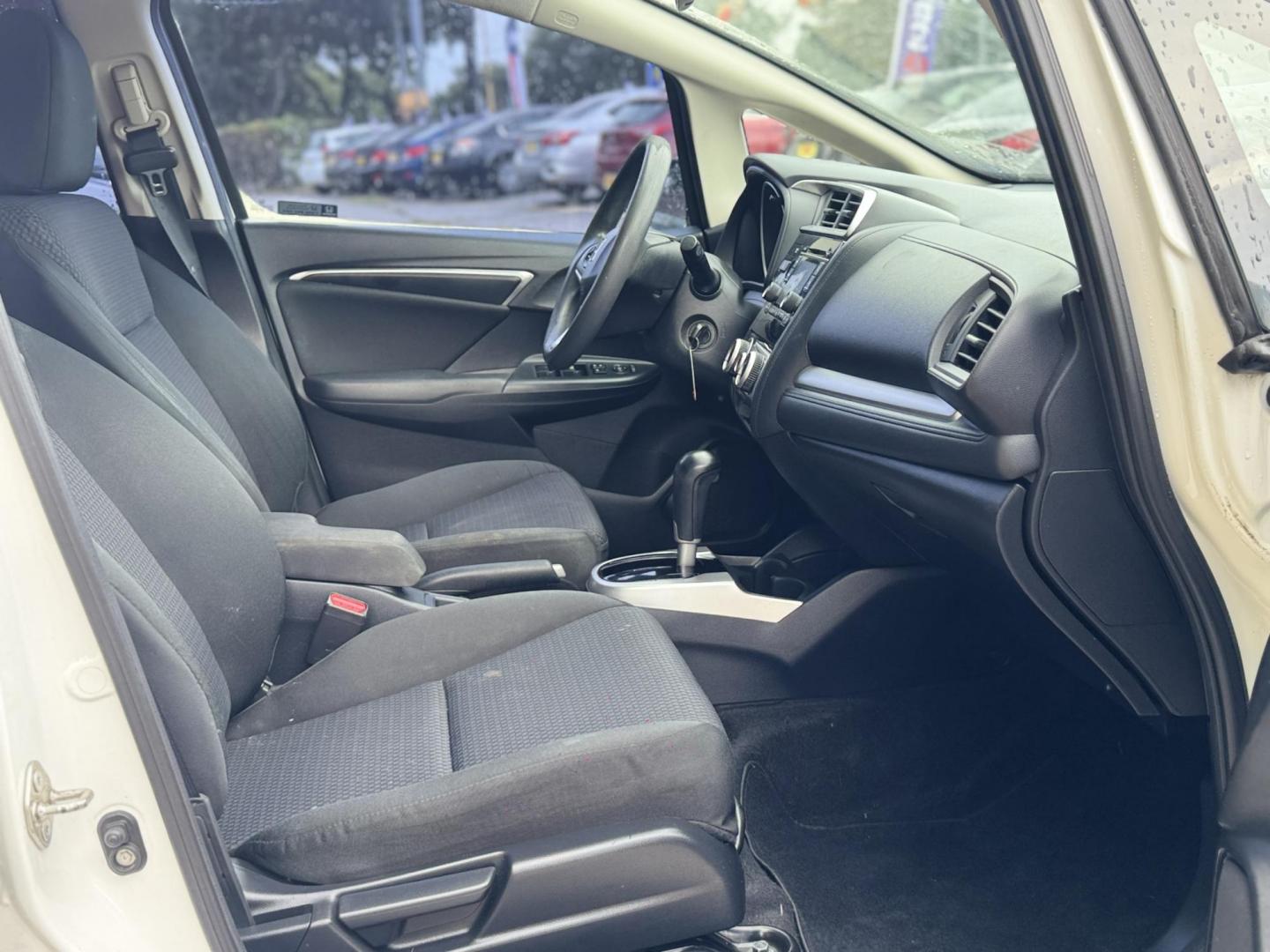 2019 White /Gray Honda Fit LX CVT (3HGGK5H47KM) with an 1.5L L4 SOHC 16V engine, Automatic transmission, located at 16710 Clay Rd., Houston, TX, 77084, (281) 859-7900, 29.834864, -95.656166 - Photo#12