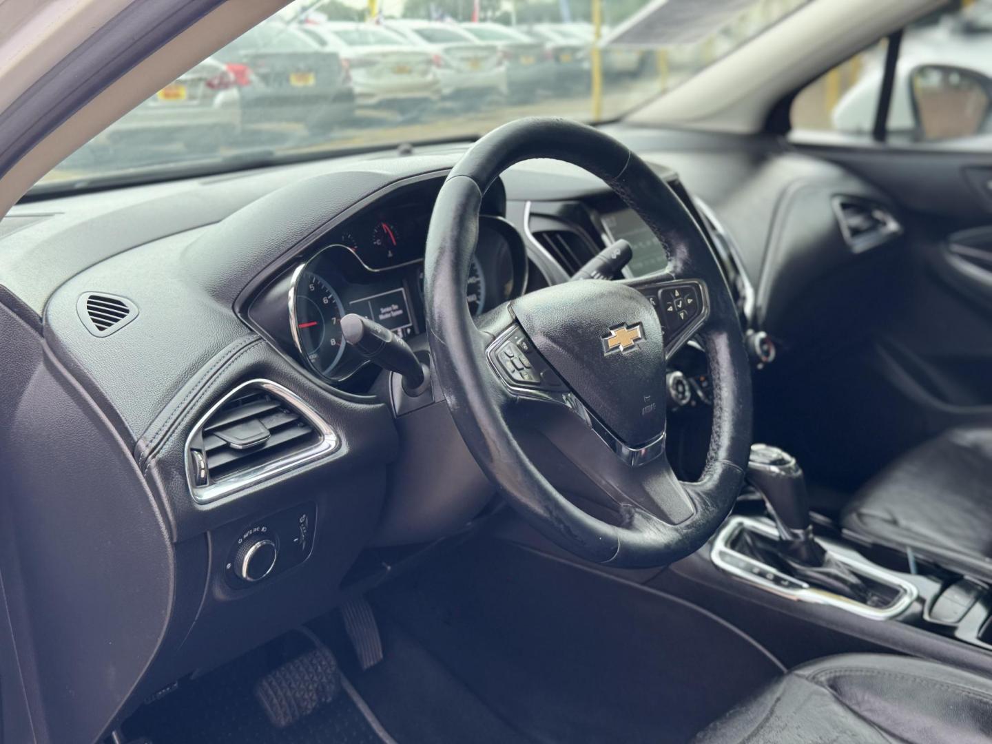 2017 White /black Chevrolet Cruze (1G1BF5SM9H7) , located at 16710 Clay Rd., Houston, TX, 77084, (281) 859-7900, 29.834864, -95.656166 - Photo#7