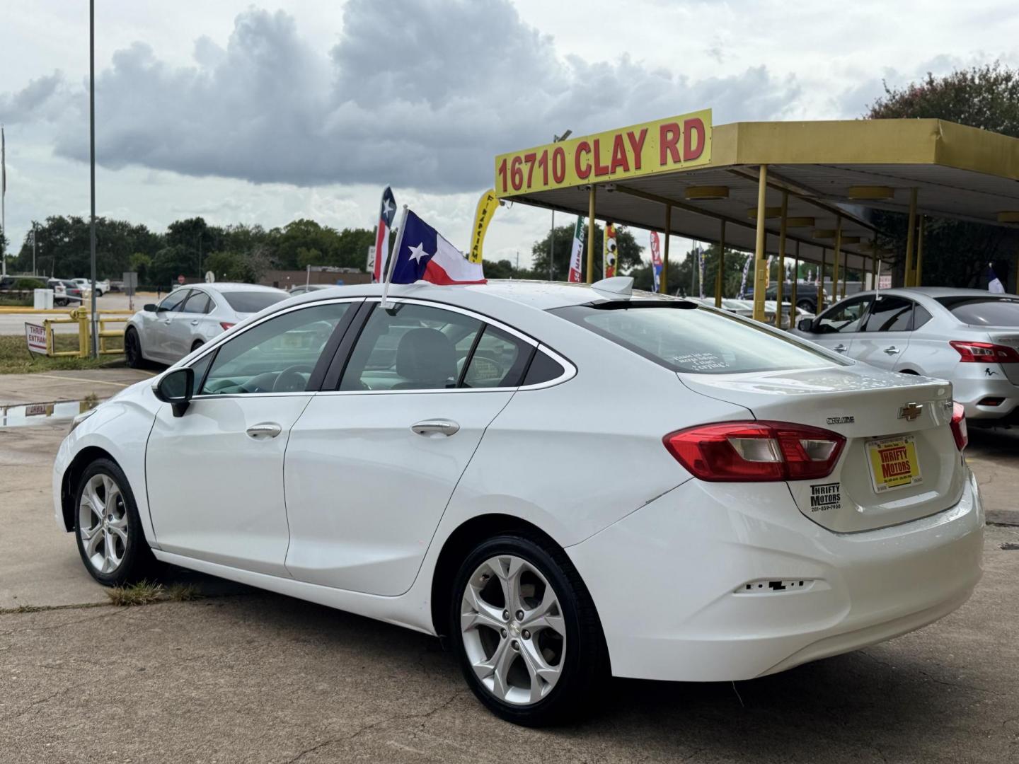 2017 White /black Chevrolet Cruze (1G1BF5SM9H7) , located at 16710 Clay Rd., Houston, TX, 77084, (281) 859-7900, 29.834864, -95.656166 - Photo#10