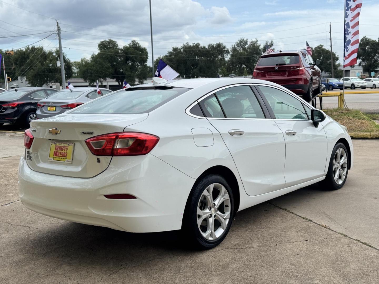 2017 White /black Chevrolet Cruze (1G1BF5SM9H7) , located at 16710 Clay Rd., Houston, TX, 77084, (281) 859-7900, 29.834864, -95.656166 - Photo#11