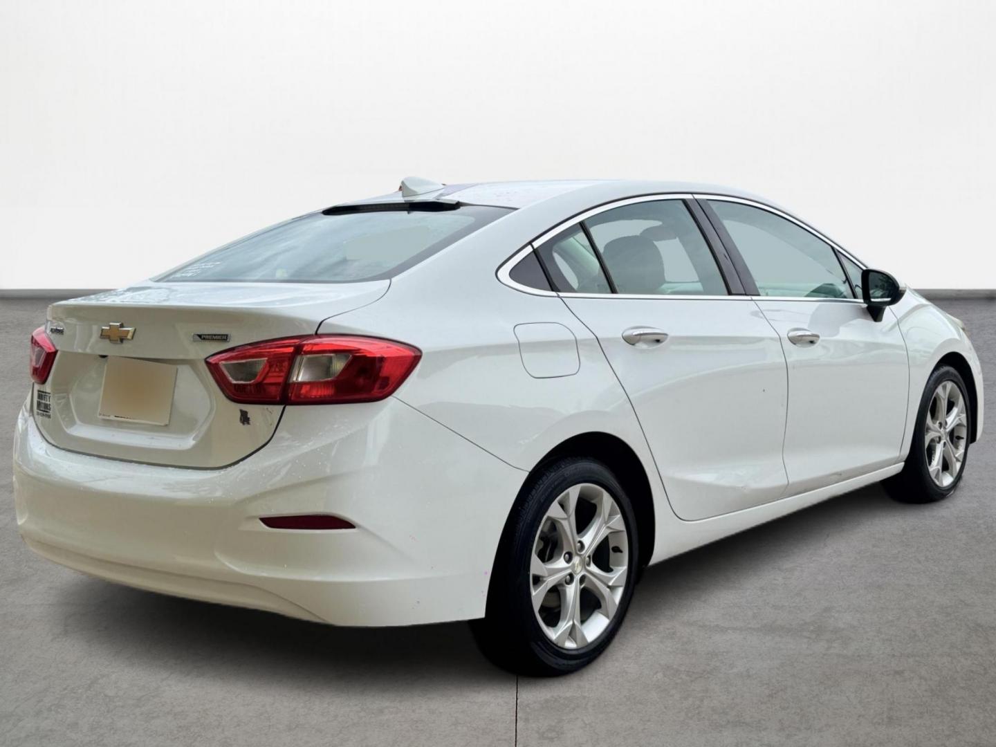 2017 White /black Chevrolet Cruze (1G1BF5SM9H7) , located at 16710 Clay Rd., Houston, TX, 77084, (281) 859-7900, 29.834864, -95.656166 - Photo#4