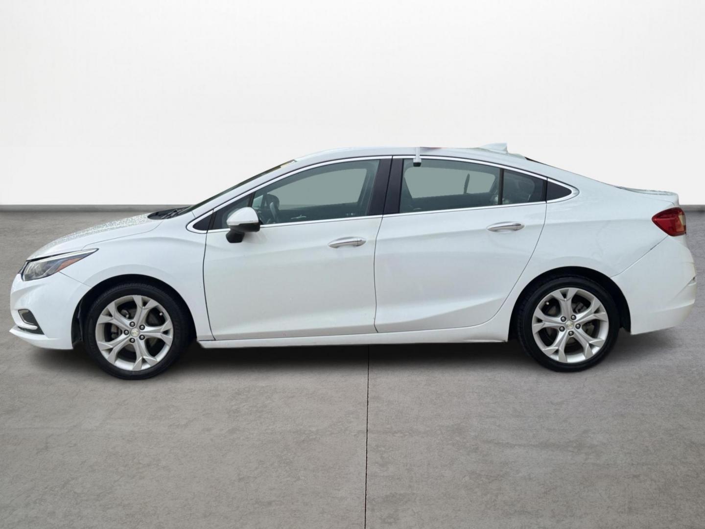 2017 White /black Chevrolet Cruze (1G1BF5SM9H7) , located at 16710 Clay Rd., Houston, TX, 77084, (281) 859-7900, 29.834864, -95.656166 - Photo#7