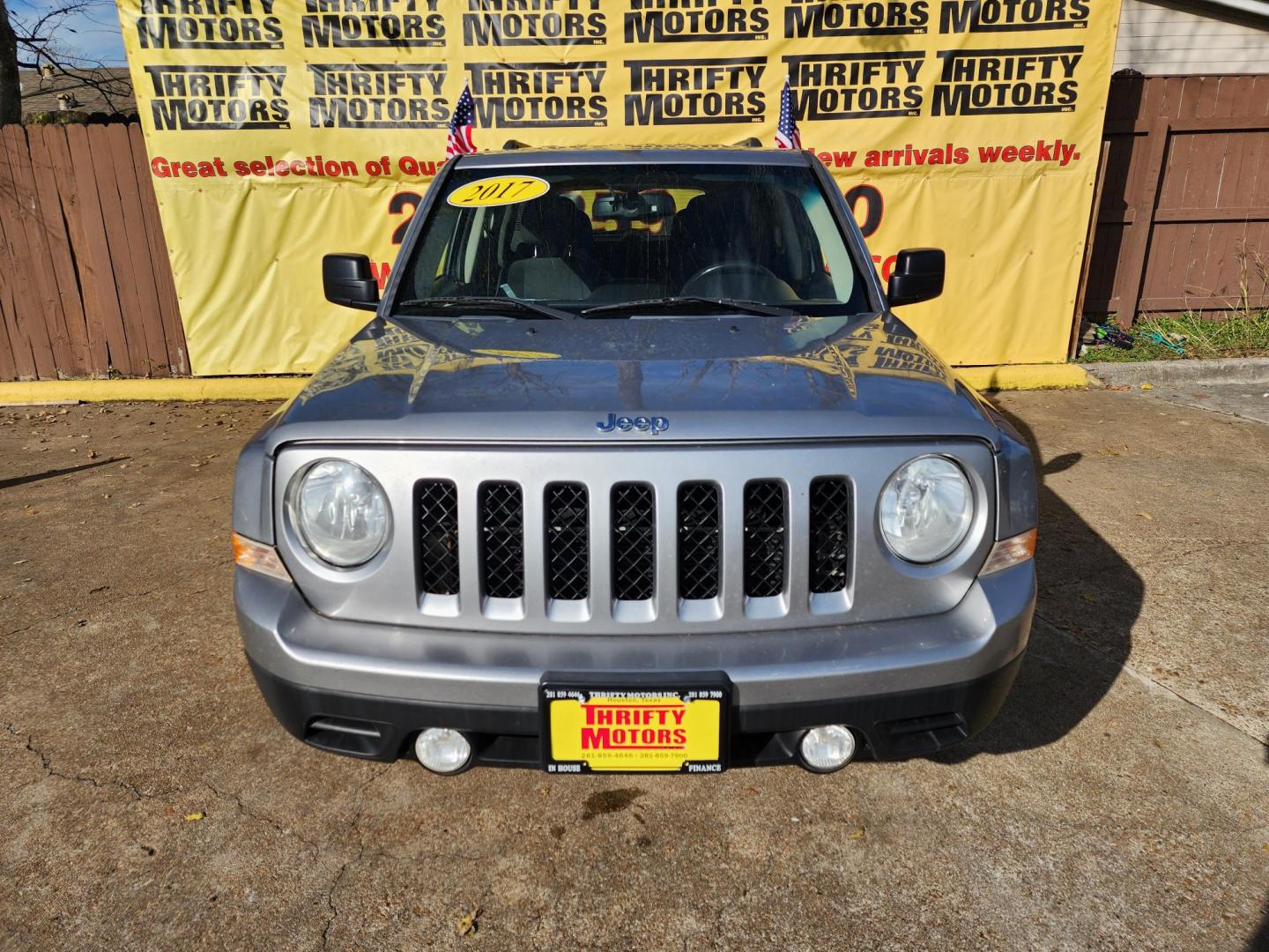2017 Silver /Black Jeep Patriot (1C4NJPFB9HD) , located at 16710 Clay Rd., Houston, TX, 77084, (281) 859-7900, 29.834864, -95.656166 - Photo#0