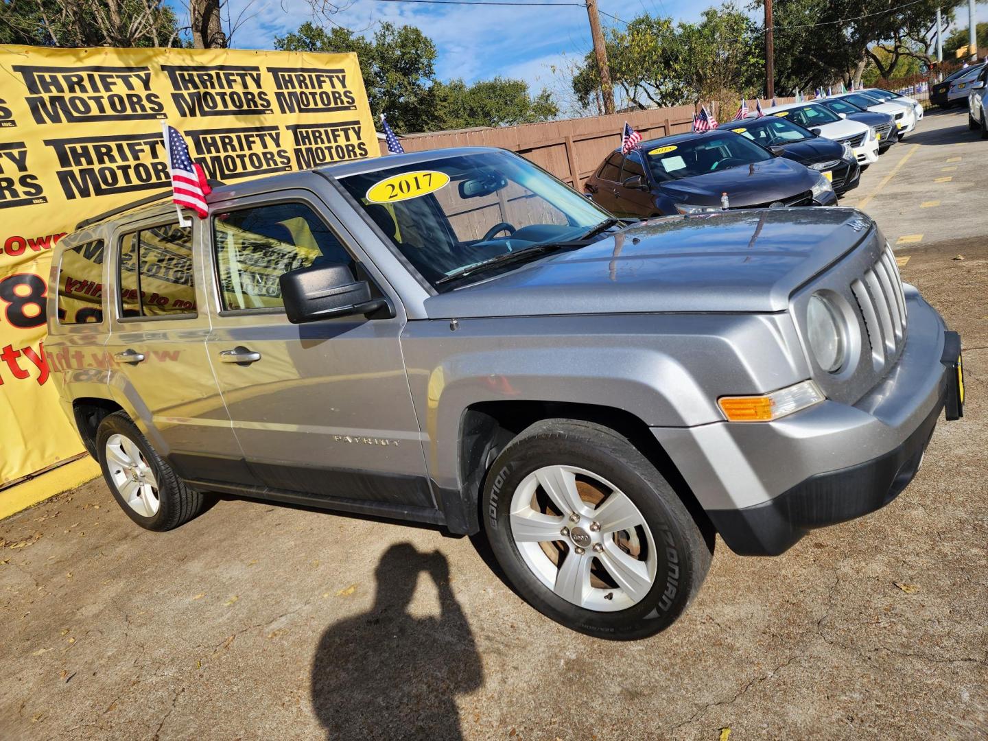 2017 Silver /Black Jeep Patriot (1C4NJPFB9HD) , located at 16710 Clay Rd., Houston, TX, 77084, (281) 859-7900, 29.834864, -95.656166 - Photo#2