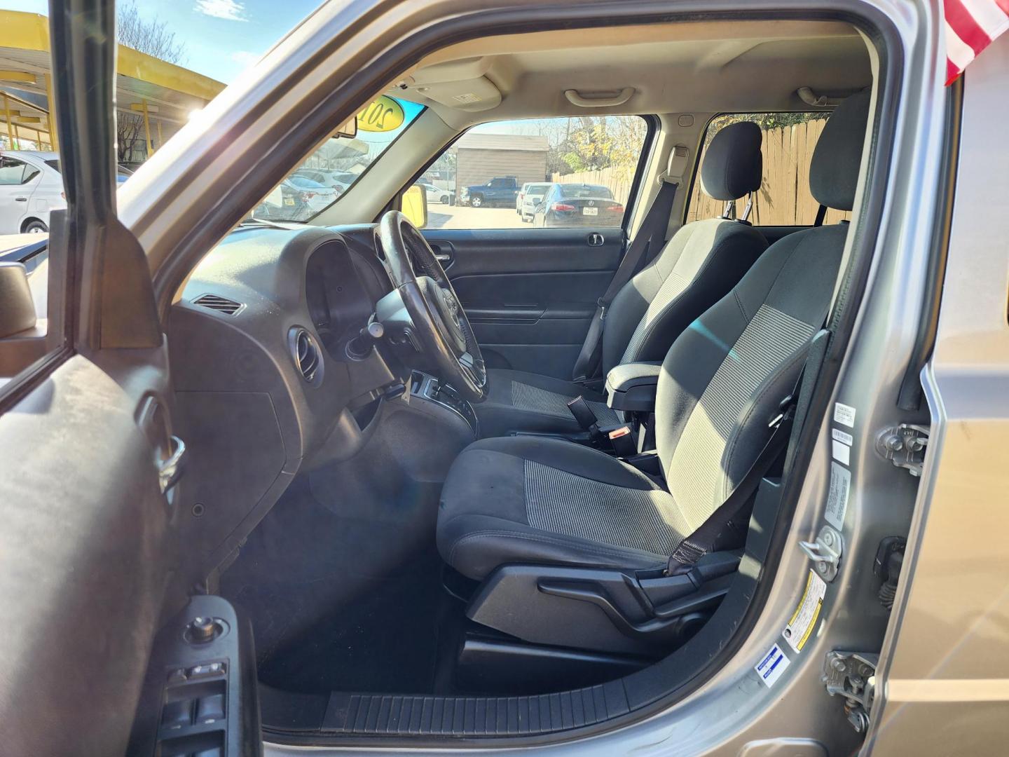 2017 Silver /Black Jeep Patriot (1C4NJPFB9HD) , located at 16710 Clay Rd., Houston, TX, 77084, (281) 859-7900, 29.834864, -95.656166 - Photo#10