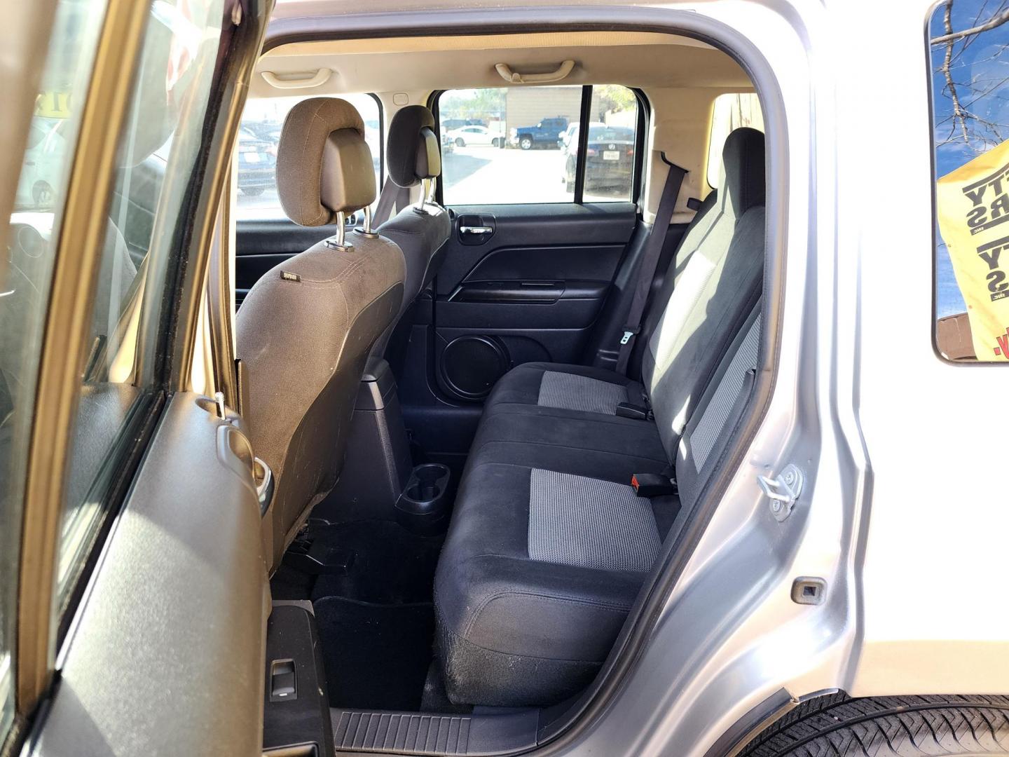 2017 Silver /Black Jeep Patriot (1C4NJPFB9HD) , located at 16710 Clay Rd., Houston, TX, 77084, (281) 859-7900, 29.834864, -95.656166 - Photo#11