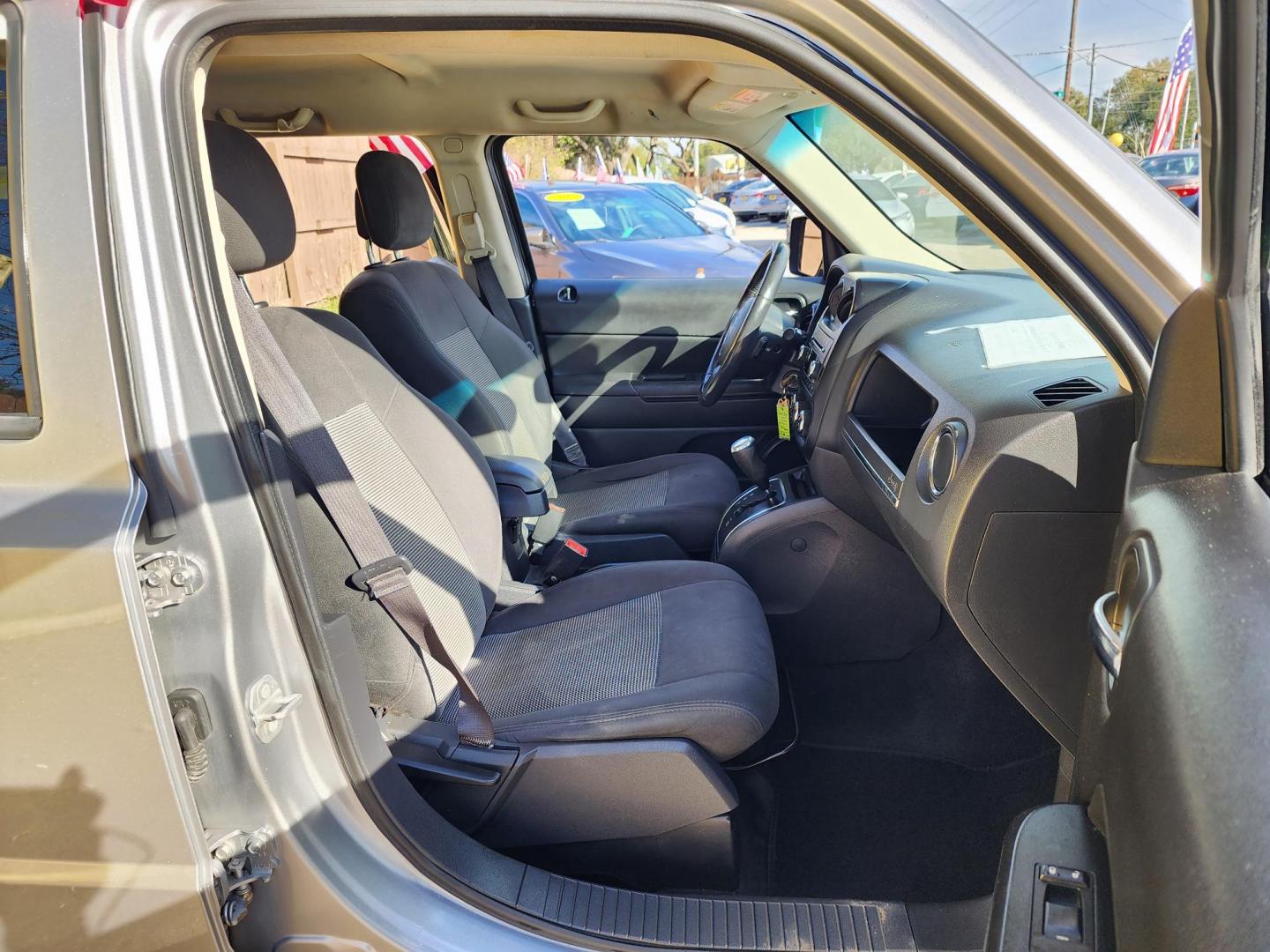 2017 Silver /Black Jeep Patriot (1C4NJPFB9HD) , located at 16710 Clay Rd., Houston, TX, 77084, (281) 859-7900, 29.834864, -95.656166 - Photo#12