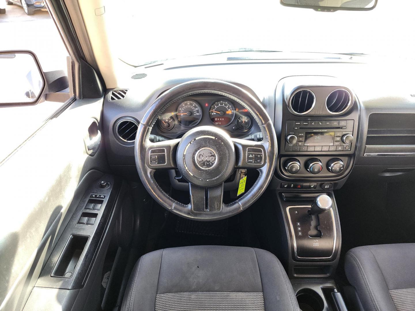 2017 Silver /Black Jeep Patriot (1C4NJPFB9HD) , located at 16710 Clay Rd., Houston, TX, 77084, (281) 859-7900, 29.834864, -95.656166 - Photo#7