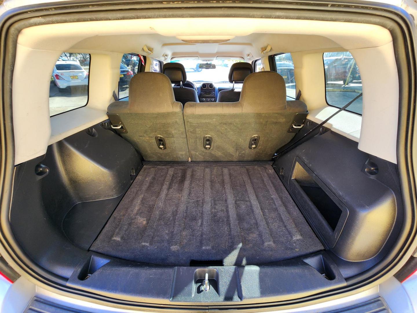 2017 Silver /Black Jeep Patriot (1C4NJPFB9HD) , located at 16710 Clay Rd., Houston, TX, 77084, (281) 859-7900, 29.834864, -95.656166 - Photo#14