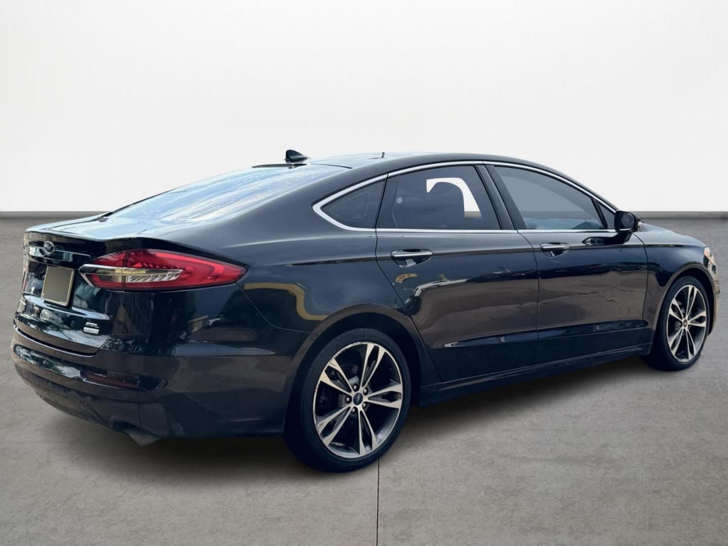 2019 Black /BLACK Ford Fusion (3FA6P0CD3KR) , located at 16710 Clay Rd., Houston, TX, 77084, (281) 859-7900, 29.834864, -95.656166 - Photo#2