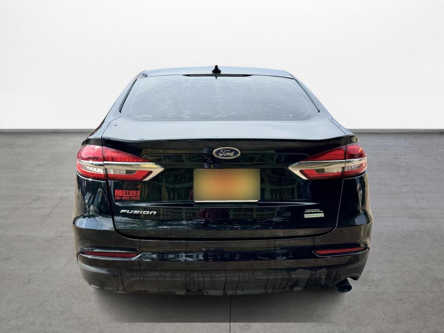 2019 Black /BLACK Ford Fusion (3FA6P0CD3KR) , located at 16710 Clay Rd., Houston, TX, 77084, (281) 859-7900, 29.834864, -95.656166 - Photo#3