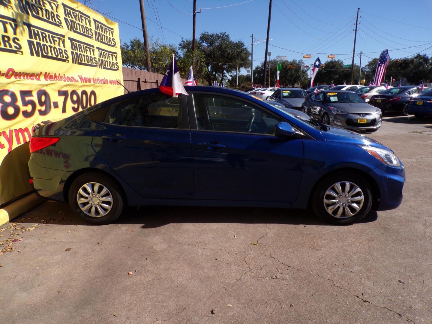 2017 Blue /Gray Hyundai Accent SE 4-Door 6M (KMHCT4AE1HU) with an 1.6L L4 DOHC 16V engine, Automatic 6-Speed transmission, located at 16710 Clay Rd., Houston, TX, 77084, (281) 859-7900, 29.834864, -95.656166 - Photo#6