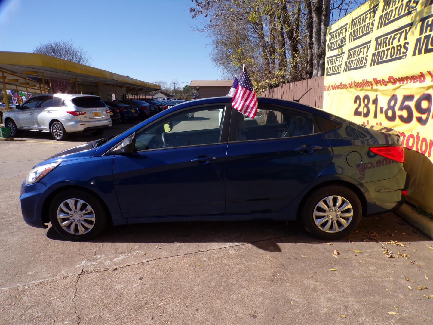 2017 Blue /Gray Hyundai Accent SE 4-Door 6M (KMHCT4AE1HU) with an 1.6L L4 DOHC 16V engine, Automatic 6-Speed transmission, located at 16710 Clay Rd., Houston, TX, 77084, (281) 859-7900, 29.834864, -95.656166 - Photo#7